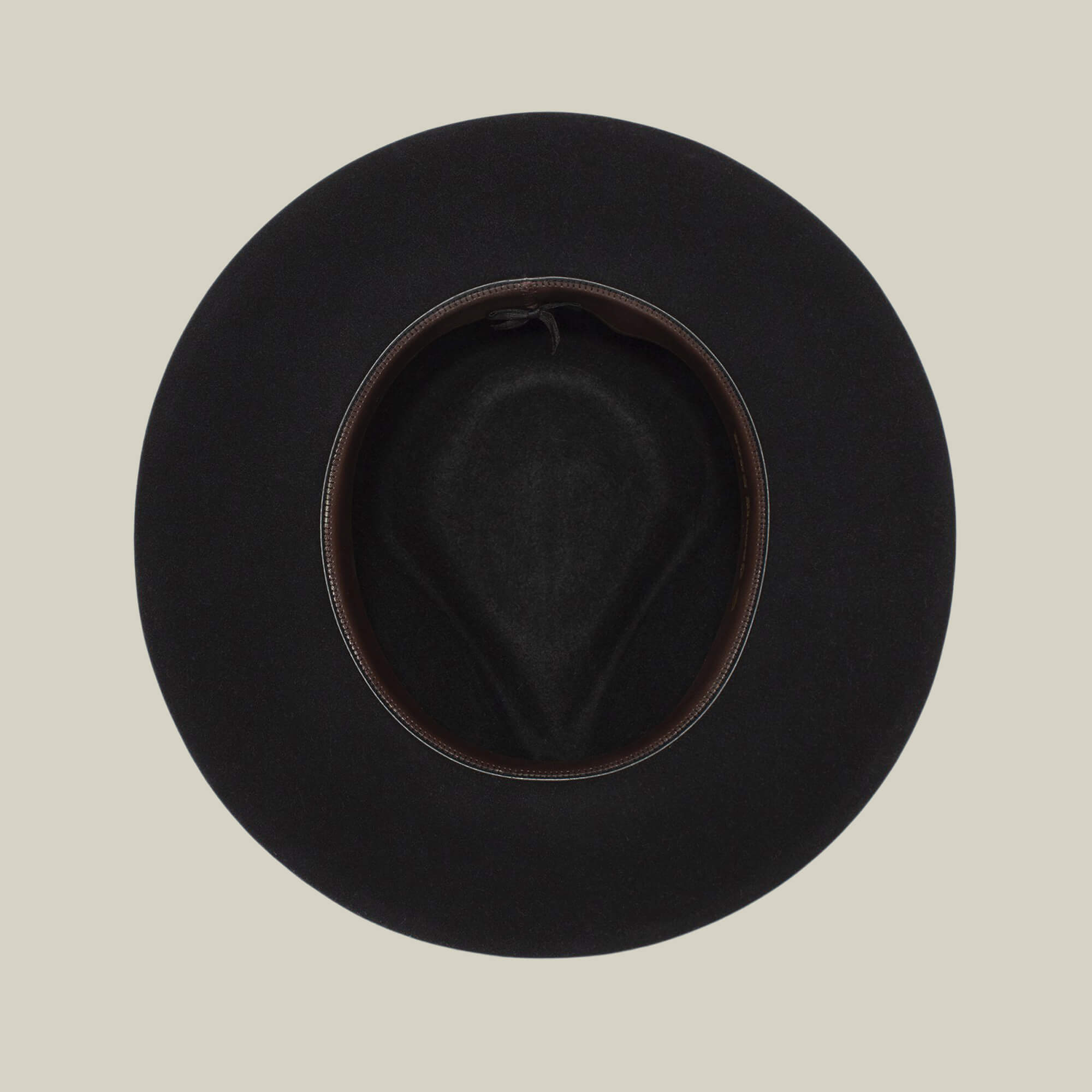 The Goorin Bros. Colonel Pierce is a black wide-brimmed hat pictured from above, highlighting its inner lining and oval opening against a simple light background.