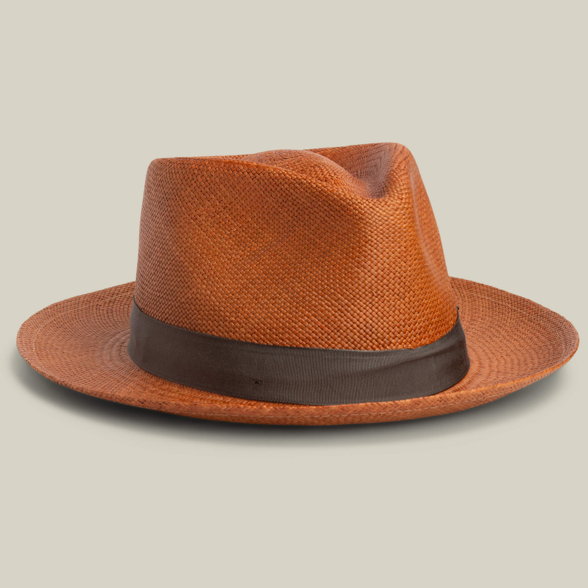 The Goorin Bros. John Sr. brown toquilla teardrop fedora hat with a dark brown ribbon band offers 50 UPF sun protection and is displayed on a neutral background.