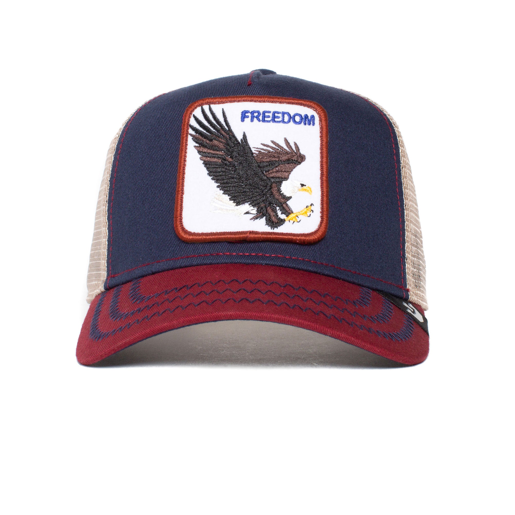 The Farm's Freedom Eagle trucker hat pairs a navy front, beige mesh back, red brim, and an eagle FREEDOM patch—ideal for staying cool and visible on the road.