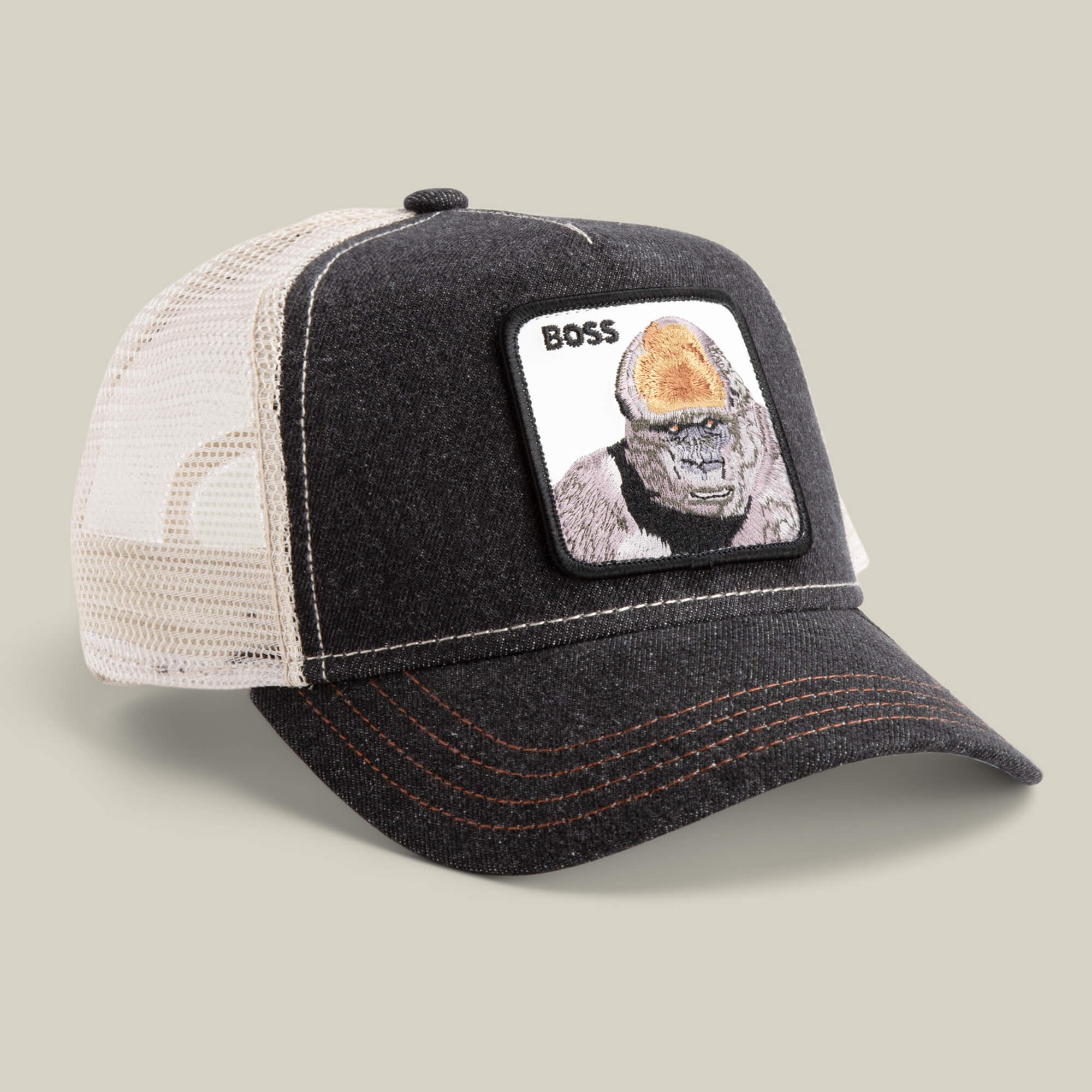 Add bold style to your look with The Boss mesh baseball cap by The Farm, featuring a black and white design and a front patch of an 800-pound gorilla with “BOSS” above it.