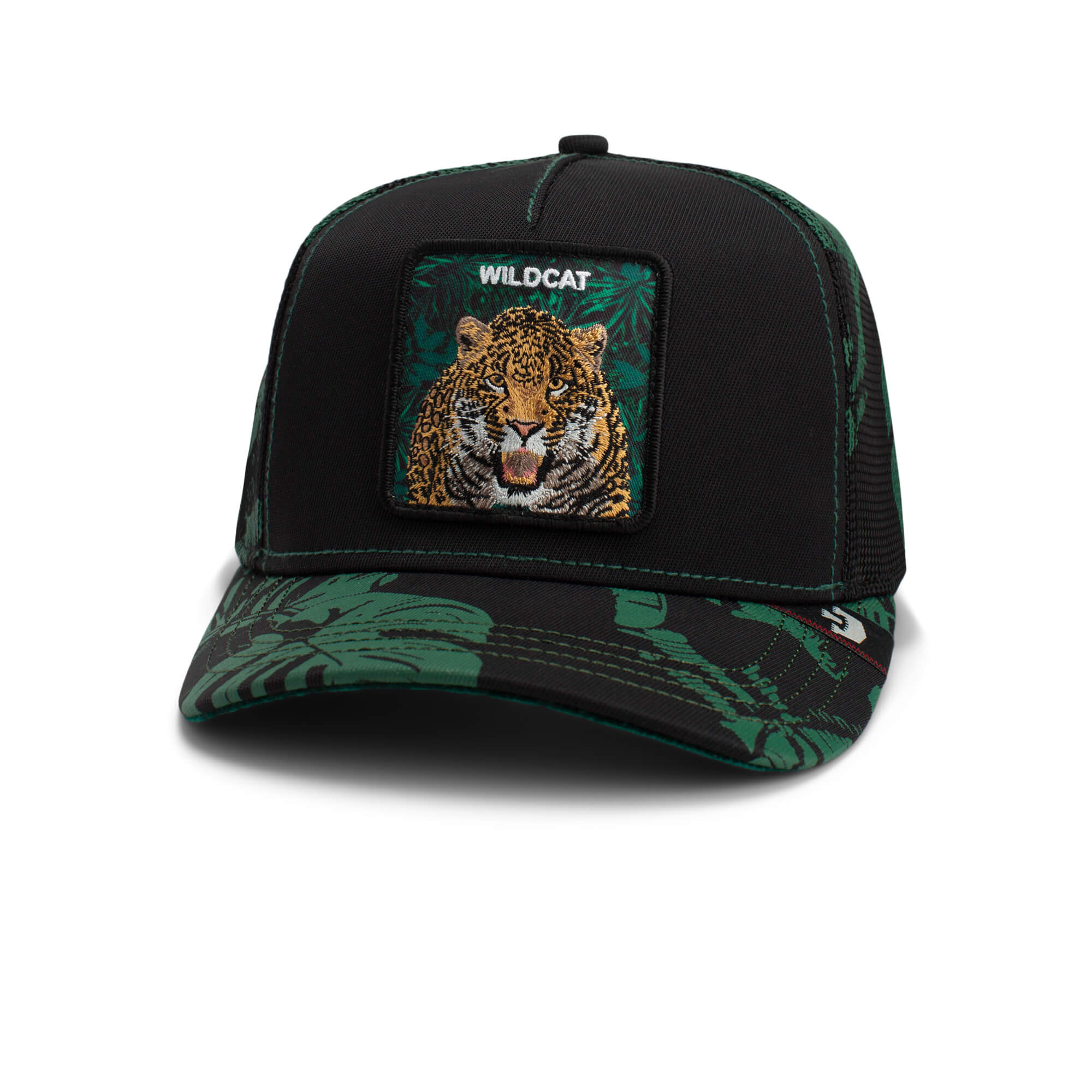 The Farm "Slash" is a black trucker hat with green leaf patterns, featuring a snarling wildcat patch and "WILDCAT" on the front. All sales final.