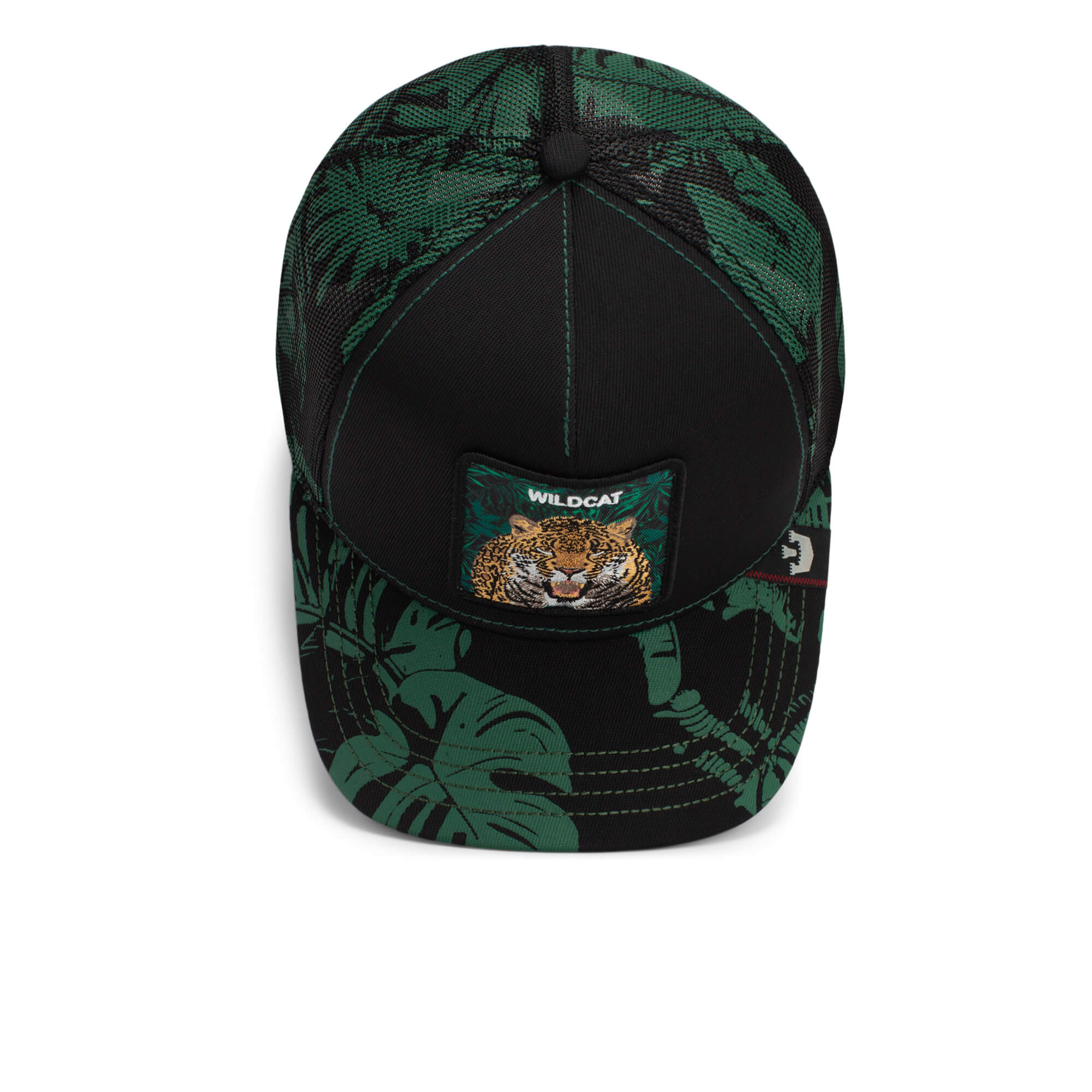 The Farm Slash black and green baseball cap features a tropical leaf pattern and a wildcat face patch with "WILDCAT" on the front. All sales are final.