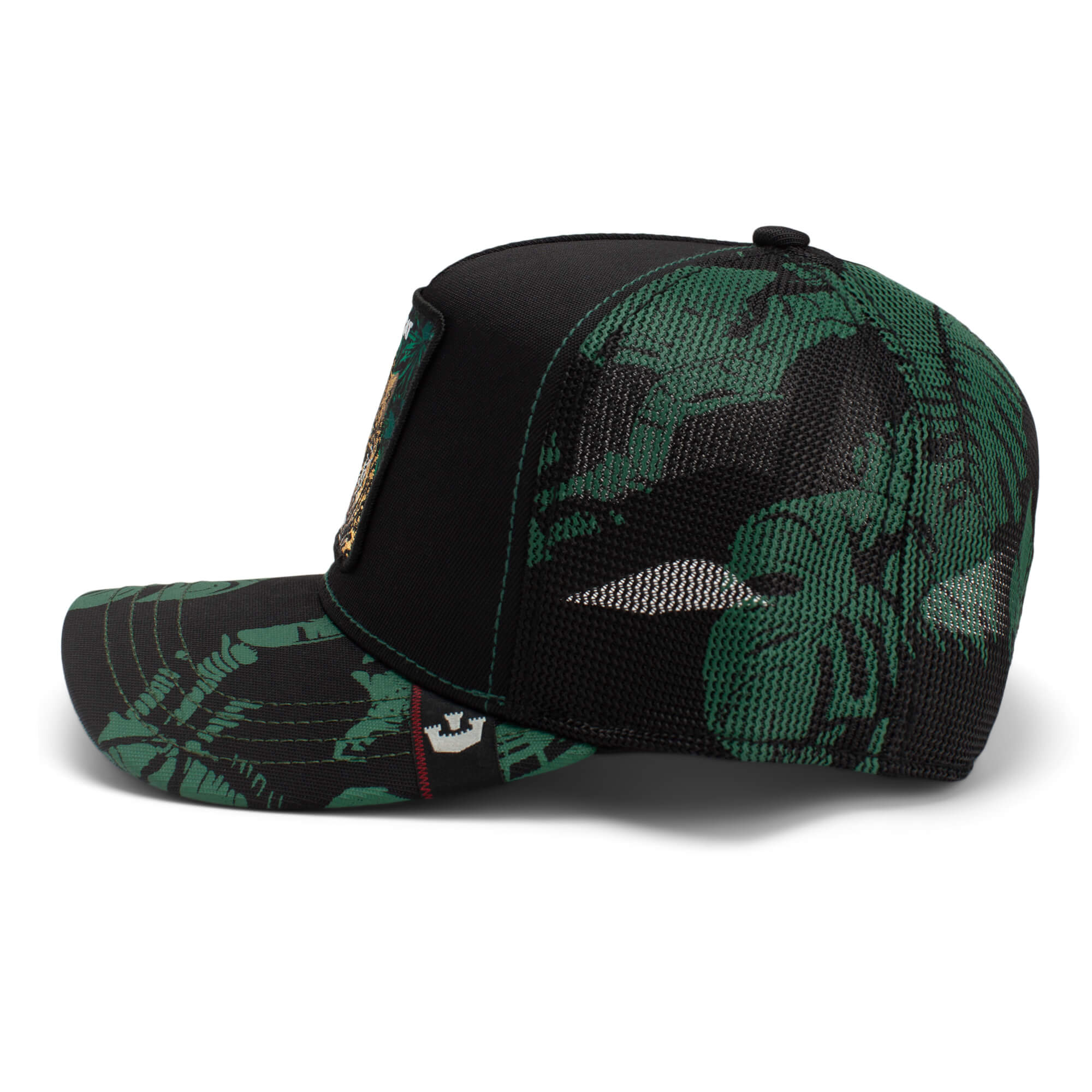 The Farm Slash cap features a black and green camouflage design with a mesh back, shown from the side. All Sales Final.