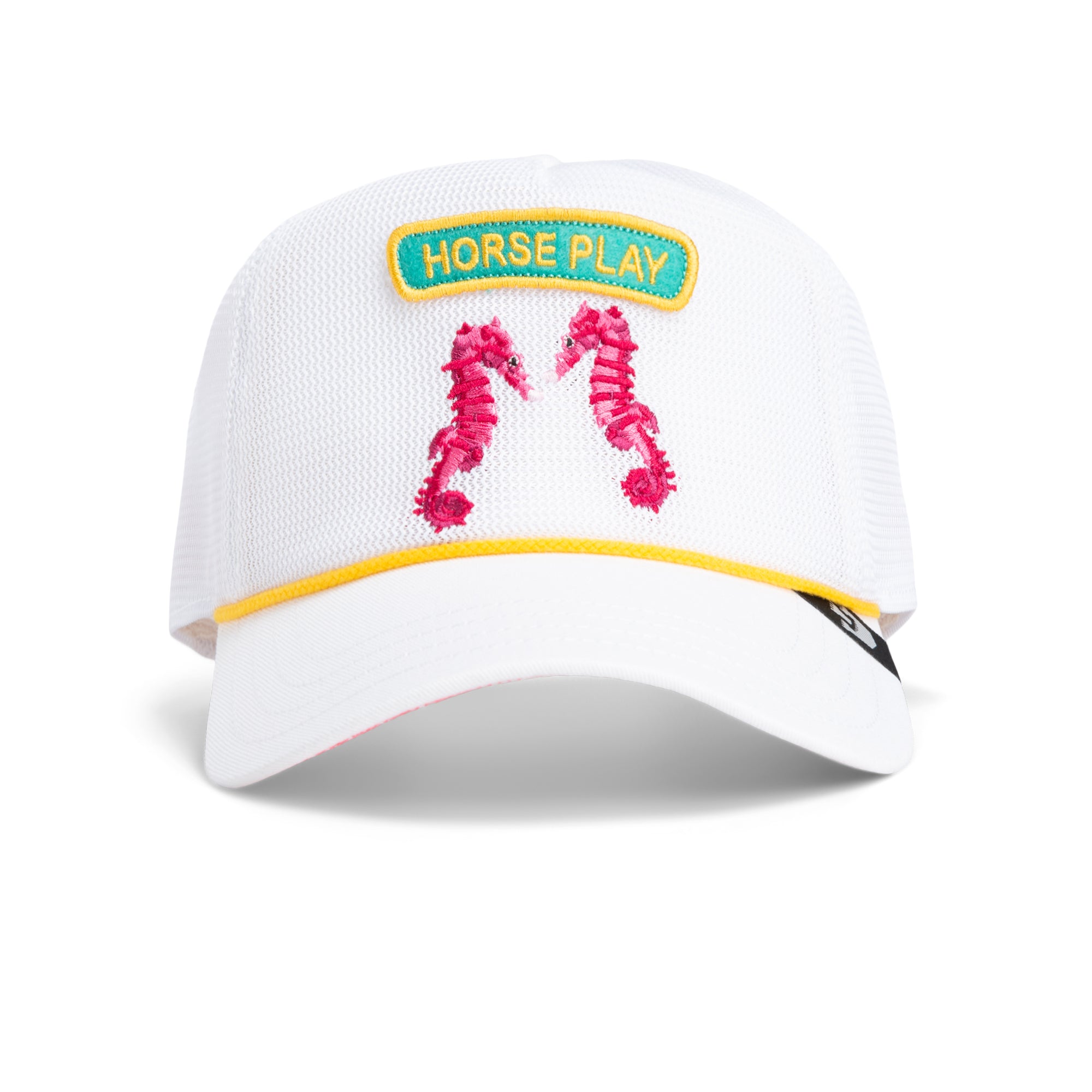 The Goorin Bros. Aquapals hat is a white mesh cap with a yellow-bordered Horse Play patch and two pink seahorses—perfect for fans of playful beach style or as a fun surf accessory.