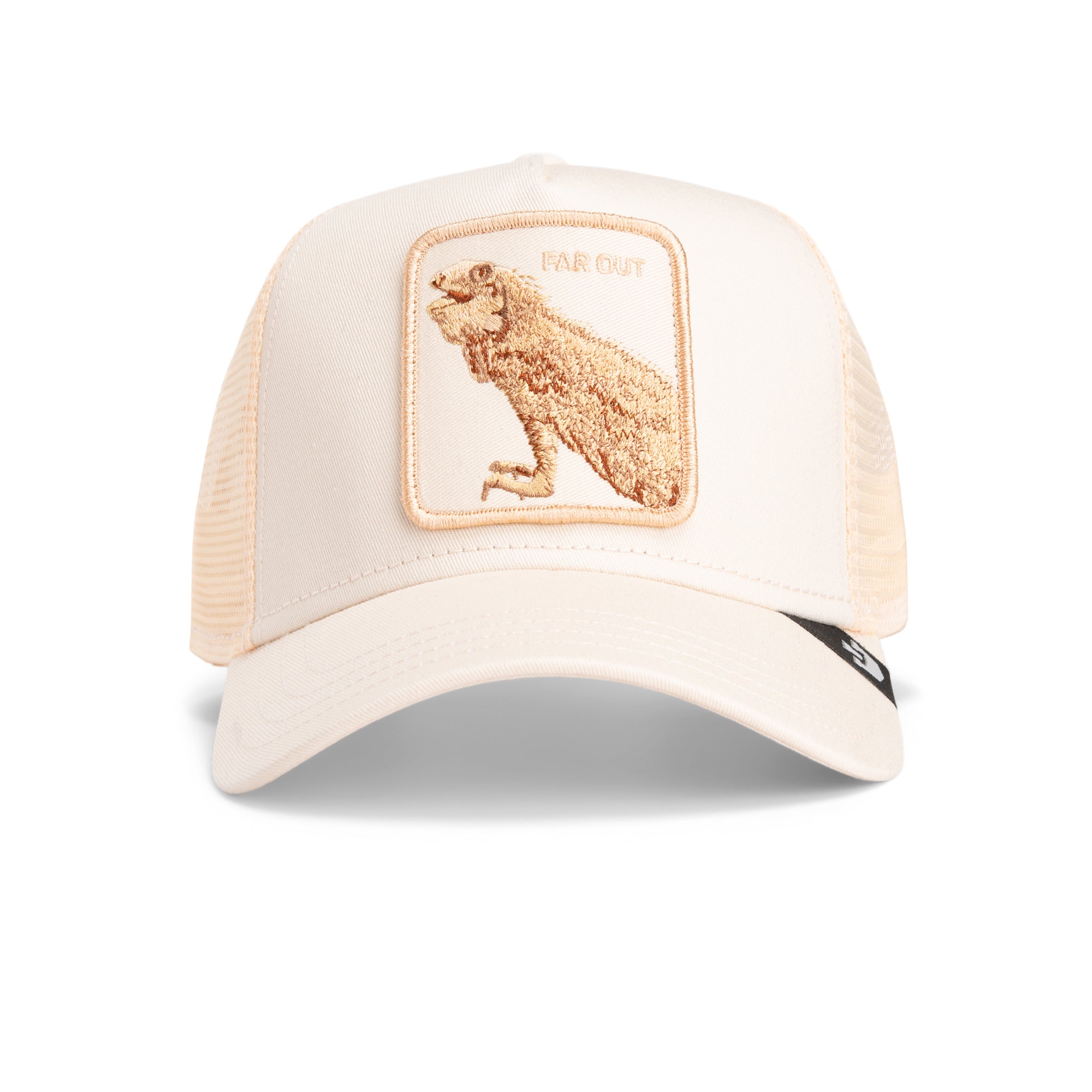 The Far Out Mirage by Goorin Bros. is a sand-colored trucker hat with a mesh back and a front patch featuring an embroidered dinosaur and "FAR OUT," inspired by the bold creativity of the Chroma Wave collection.