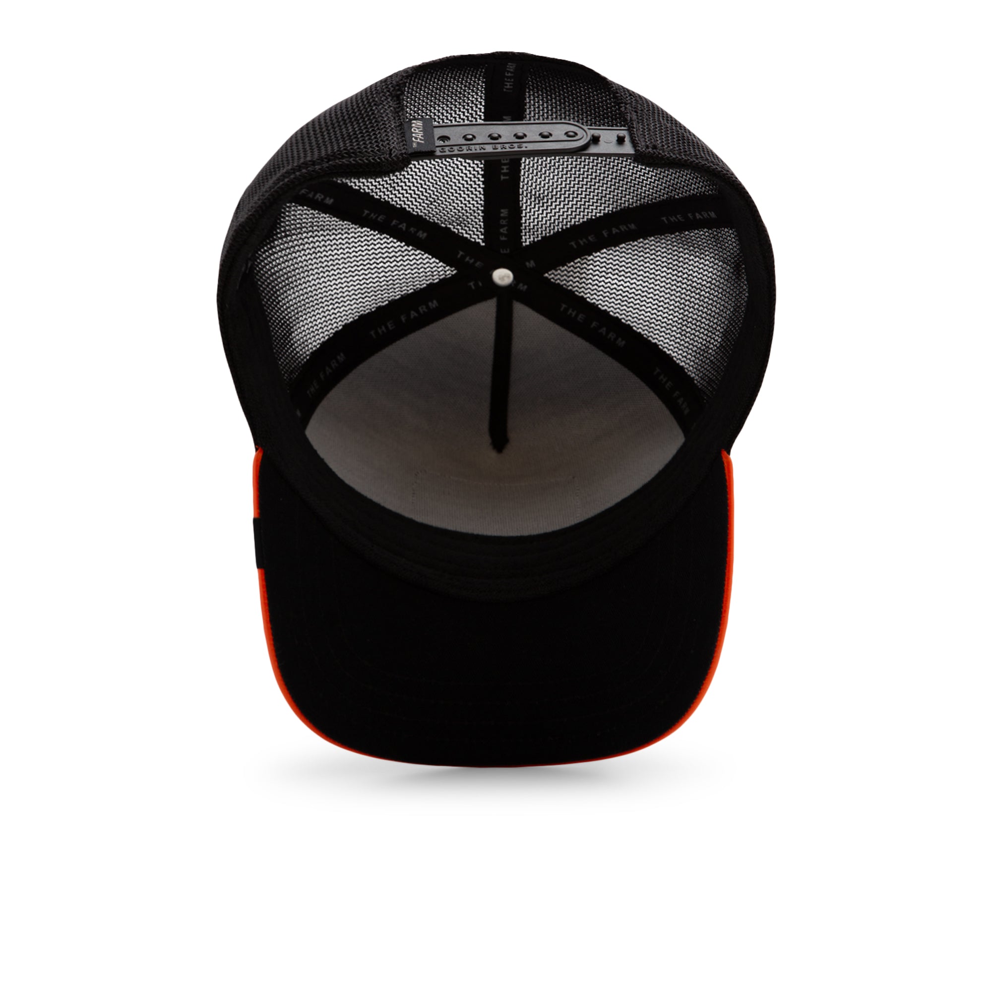 The Farm Shell Smoke trucker cap features black mesh, an adjustable snapback closure, white inner lining, and a curved brim with an orange edge. Please note all sales are final.