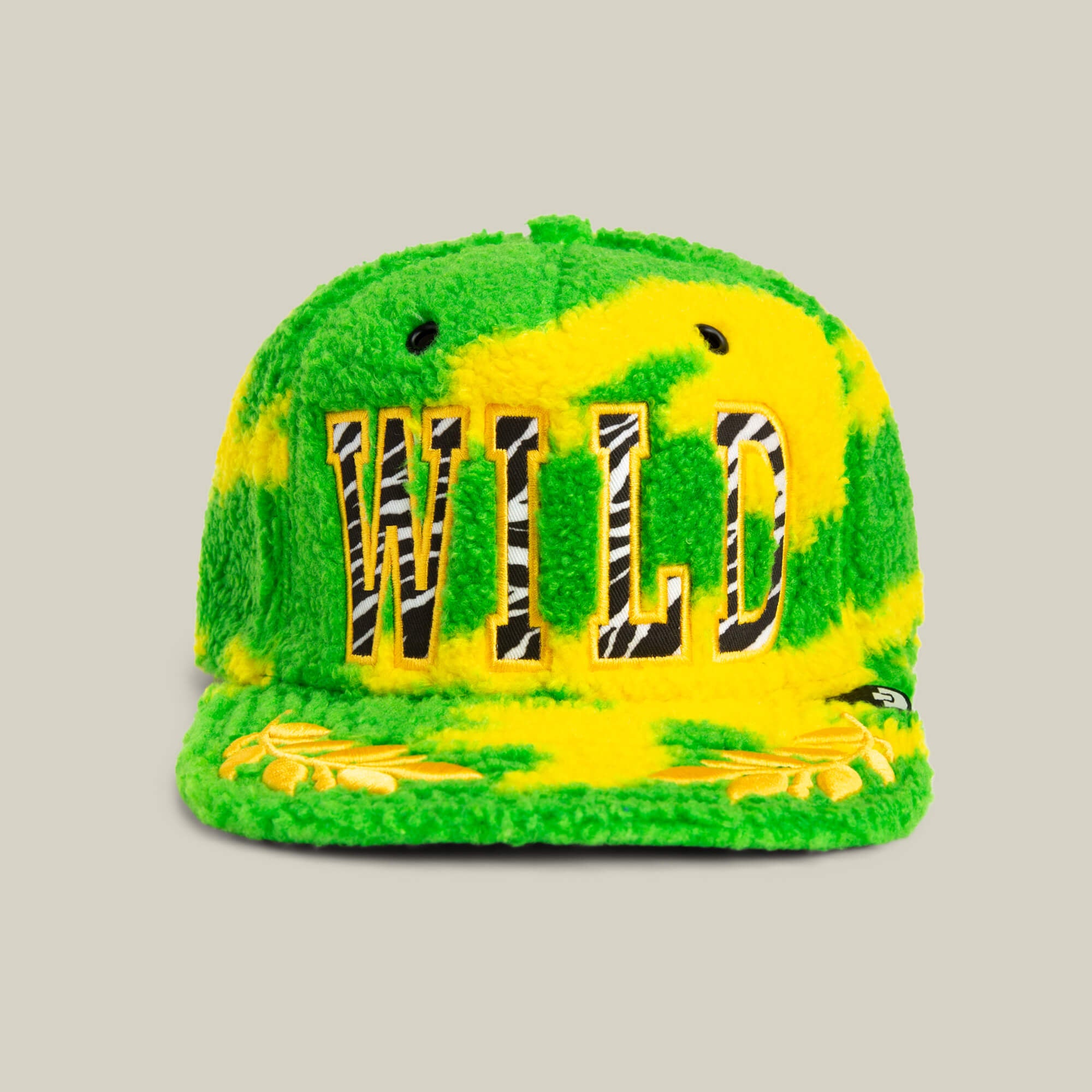 The Loose Cannon by Goorin Bros. is a green and yellow hat with an amplified silhouette, perfect for adding bold style to any look.