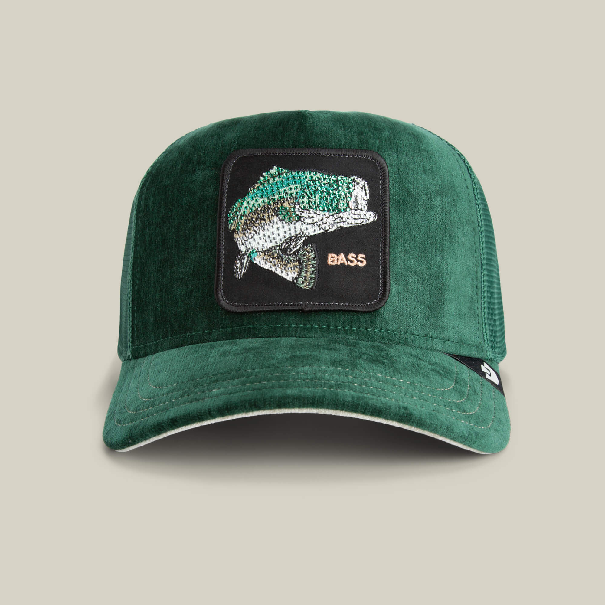 The Iced Bass by Goorin Bros. is a GUARD-colored velour baseball cap with an embroidered fish patch and BASS on the front, perfect for adding luxe flair to your casual style.