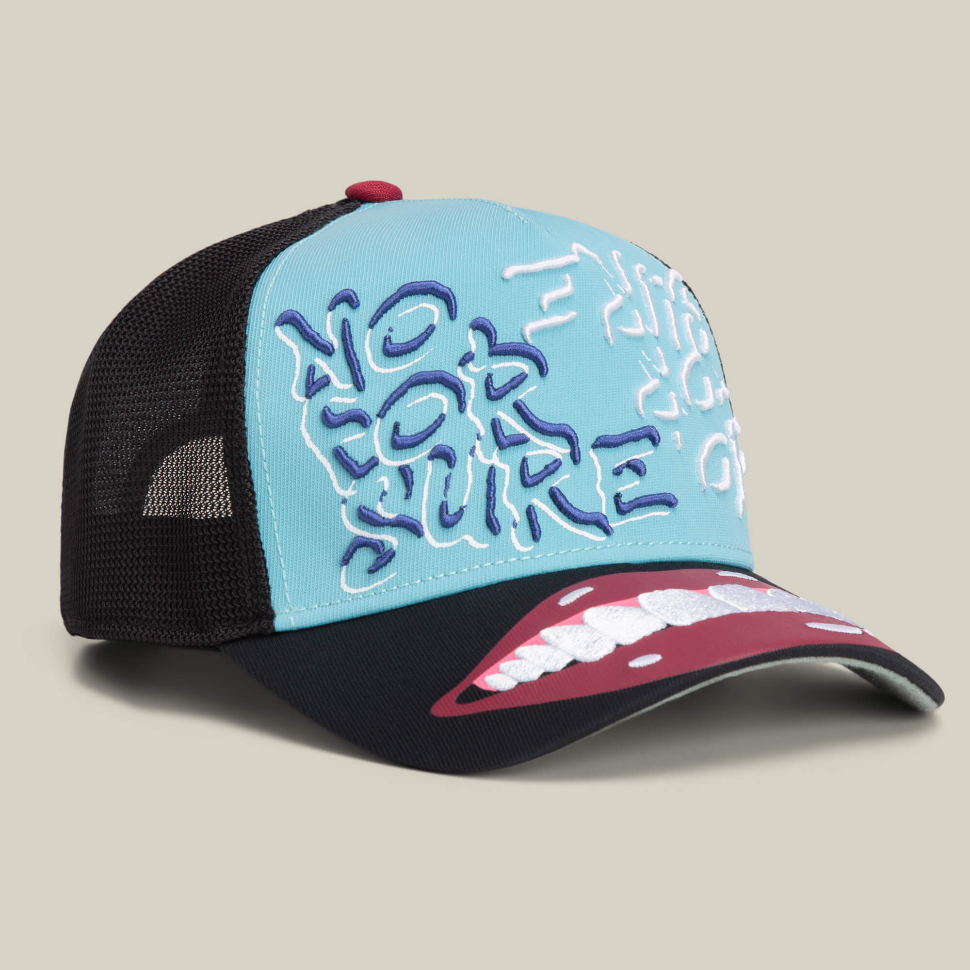 The Goorin Means Understood hat features blue and black mesh, "NO FOR SURE" embroidery, and an open mouth graphic on the brim—an eye-catching way to express confidence.