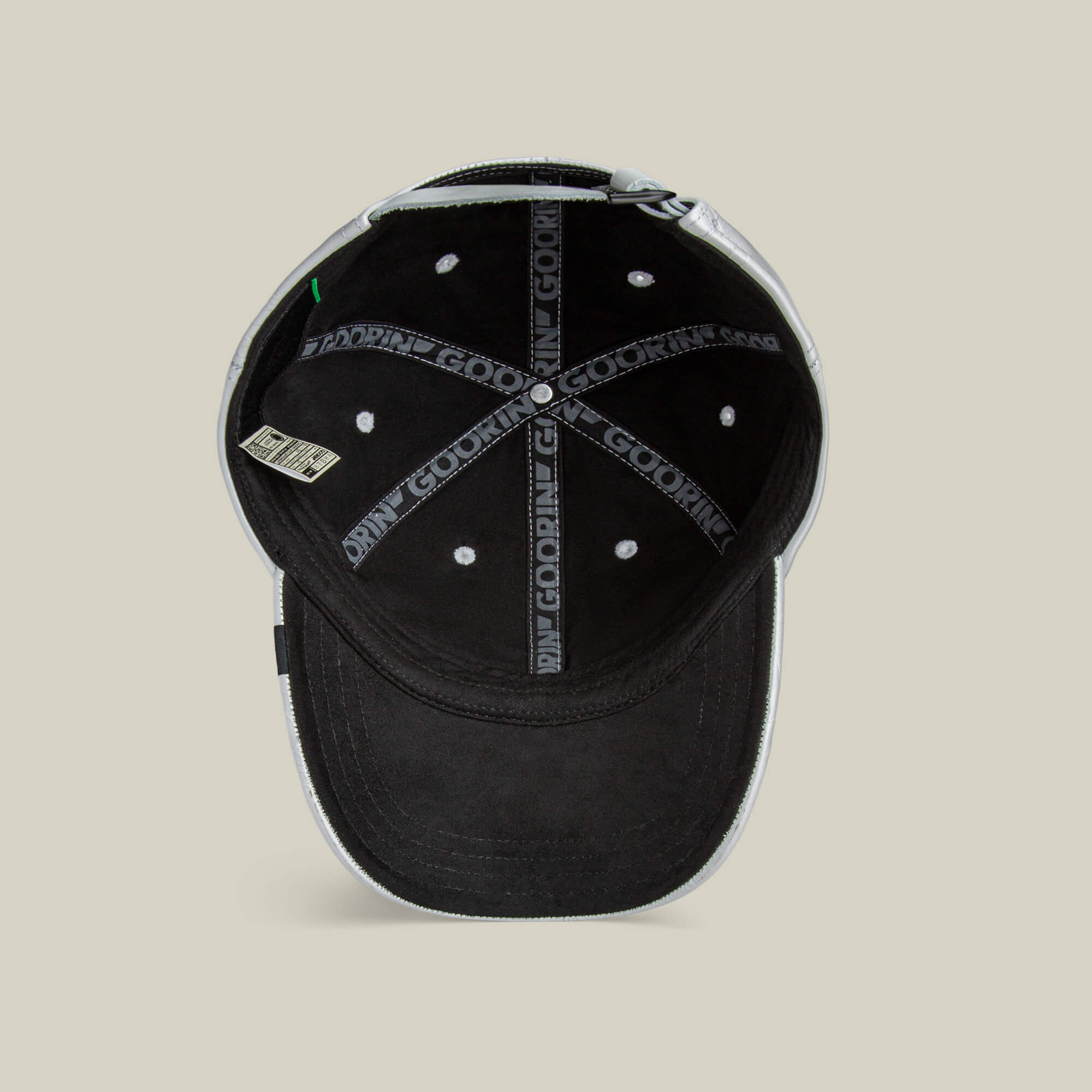 The Put a Panther On It classic fit black baseball cap by Goorin Bros. has white stitching, a small fabric tag on the left, and an inner seam tape with GOODLIFE print, evoking the sleek style typical of Goorin hats.