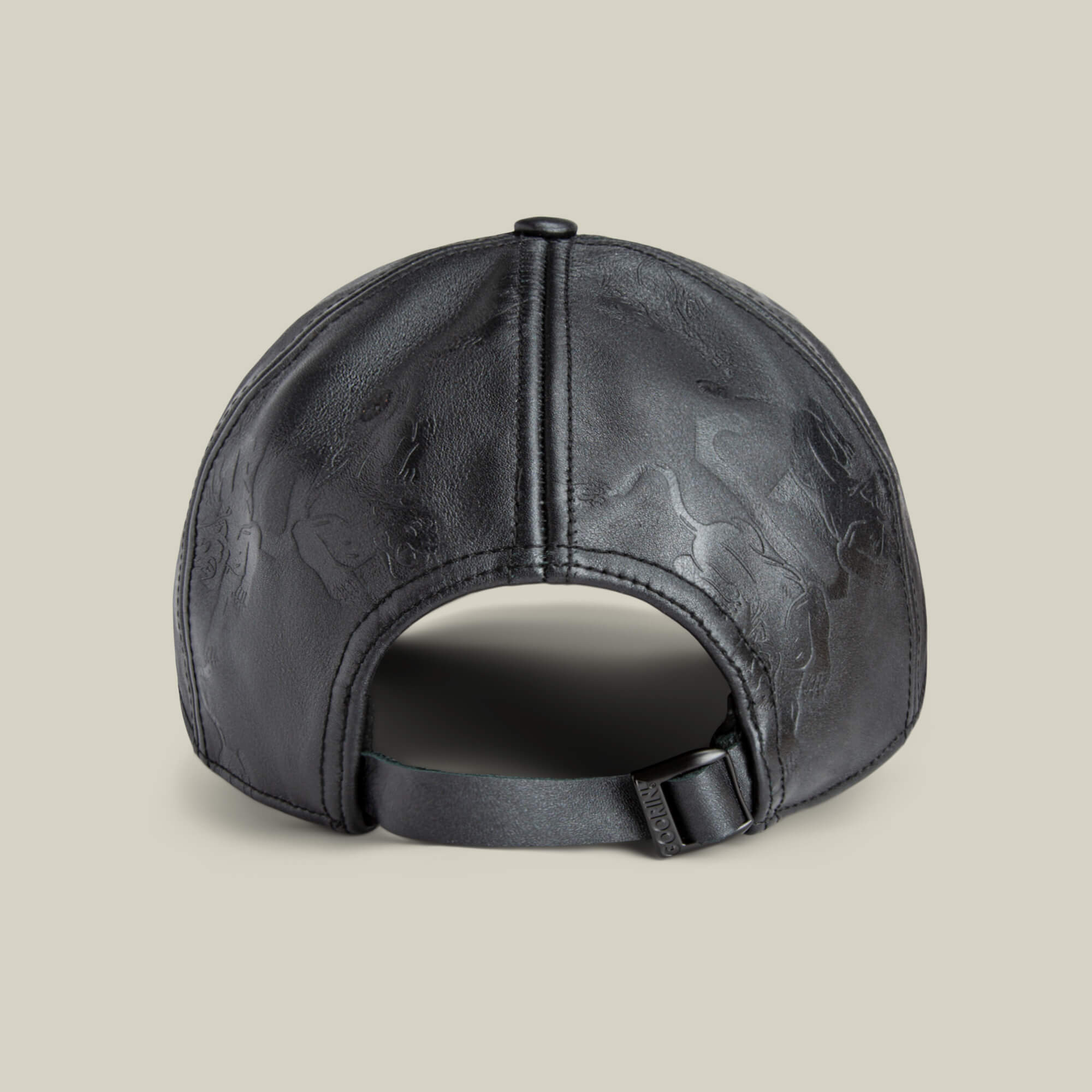 The "Put a Panther On It" cap by Goorin Bros. is shown from the back in black leather, featuring a classic fit, adjustable strap, and subtle embossed patterns on the surface.