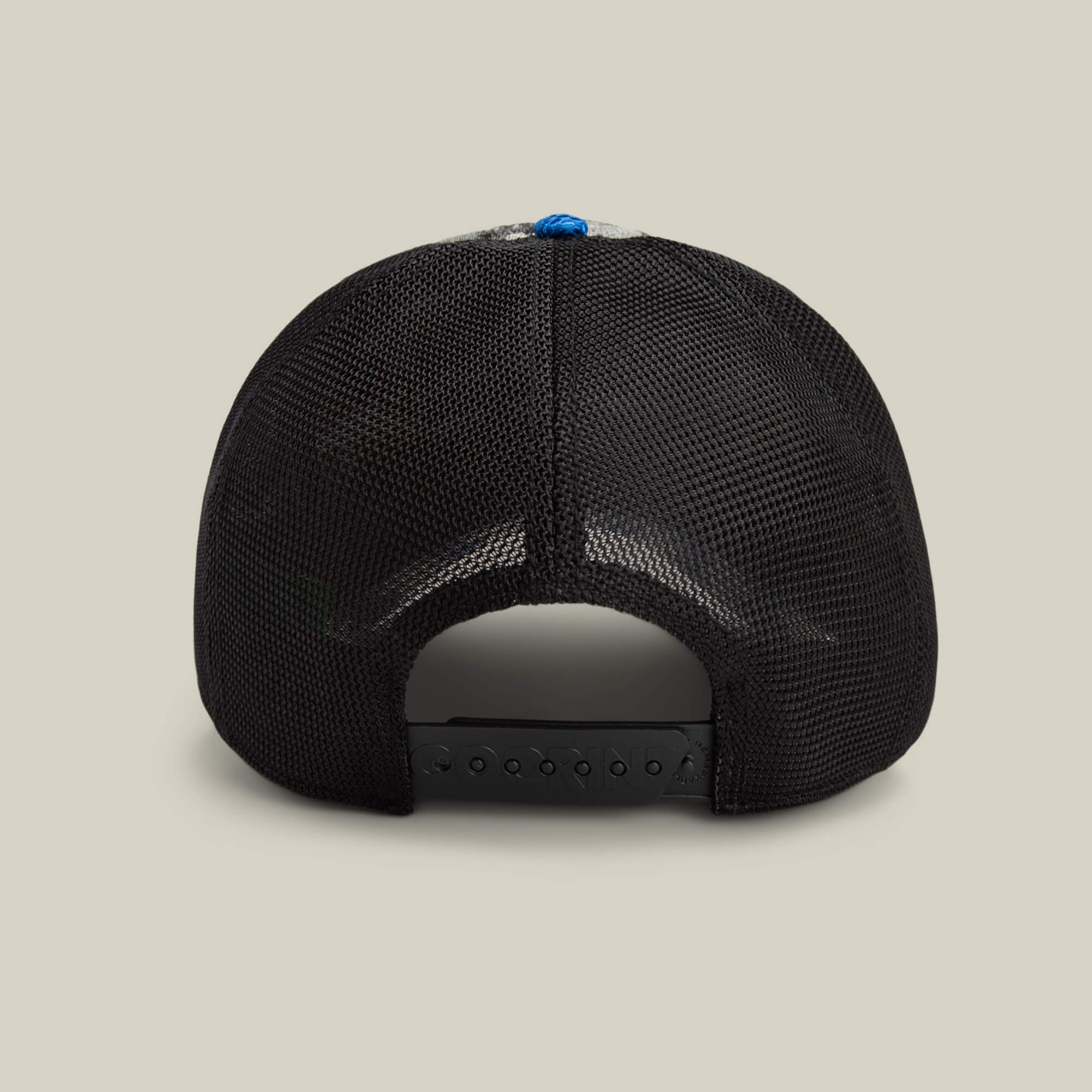The Goorin Bros. Techno black mesh trucker hat is shown from the back with an adjustable snapback closure, ideal for rave hats or festival fashion against a light background.