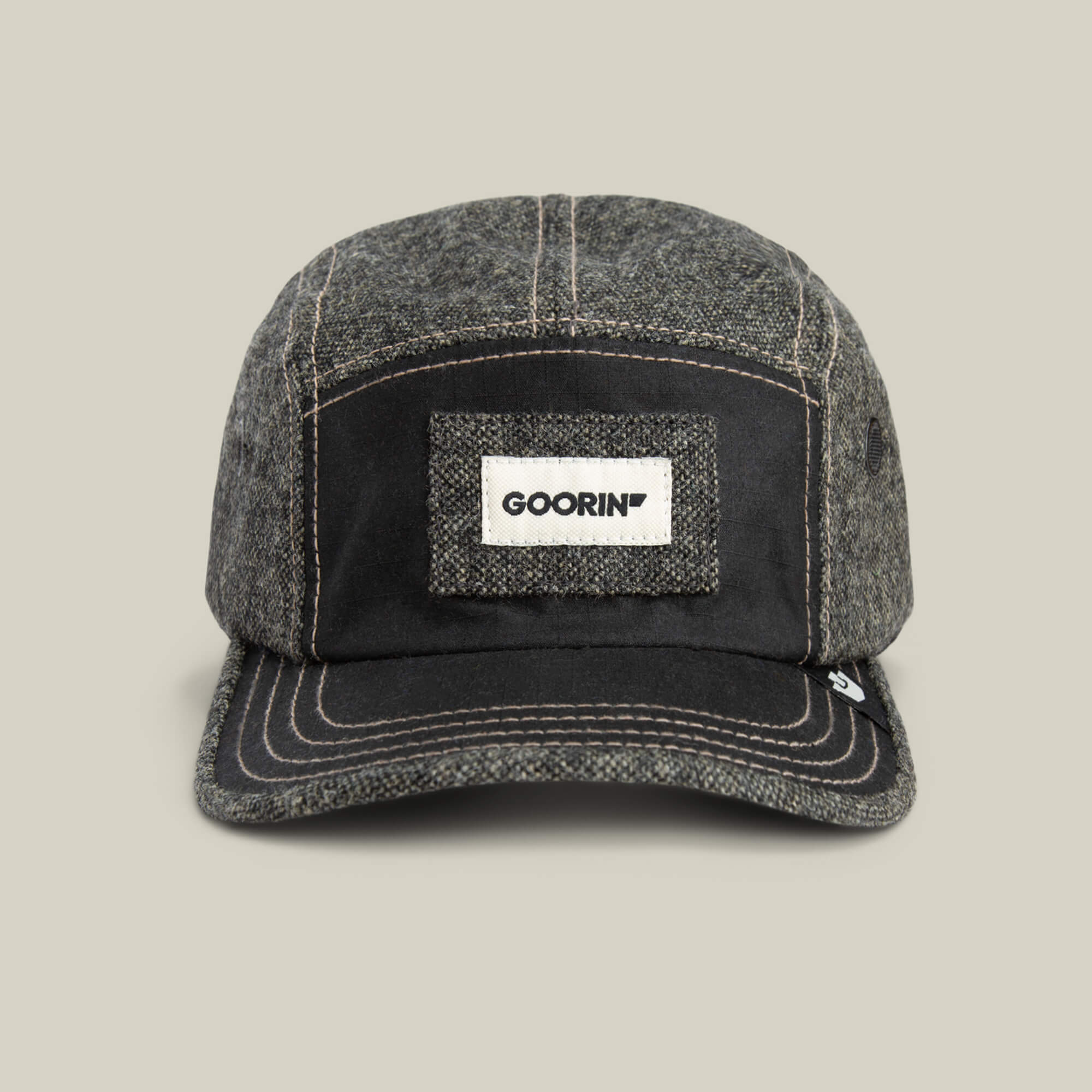 The Billed Demand by Goorin Bros. is a VOID-colored fabric field hat with a denim texture, white stitching, and a rectangular Goorin patch featuring the GOORIN logo on the front.