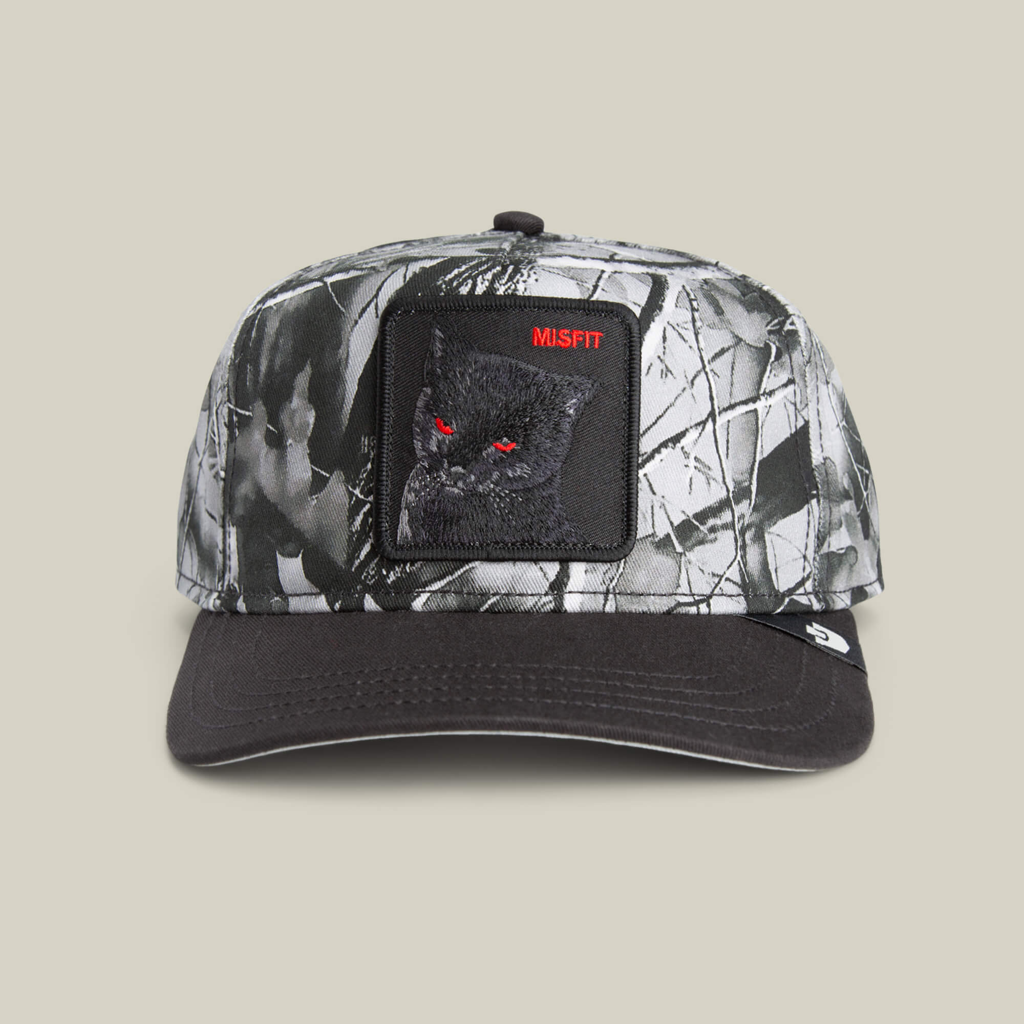 The Goorin Bros. Misfit Camo snapback features a black brim, a bold black cat patch with red eyes and "MISFIT" above it, all in a Low Pro Fit for standout style and comfort.