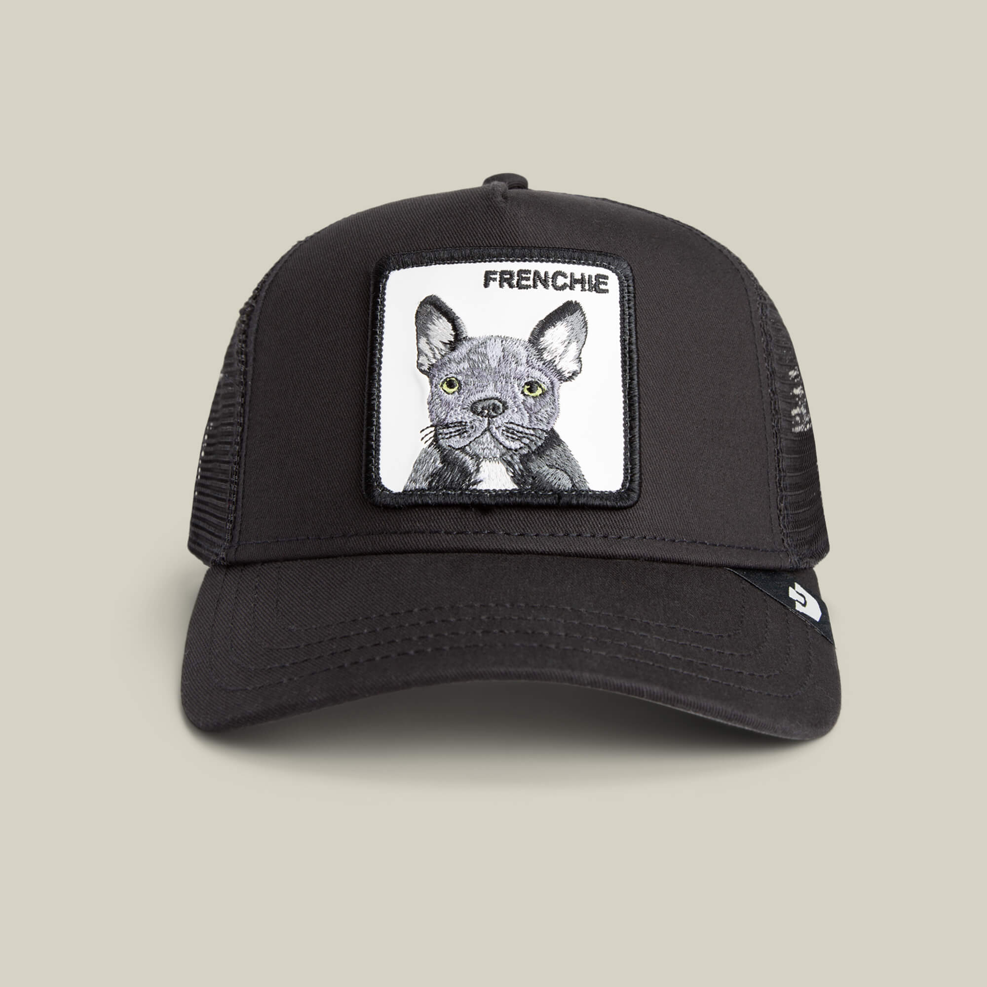The Frenchie Dog trucker hat by Goorin Bros. features a mesh back and a front patch with an embroidered gray French bulldog and “FRENCHIE”—a cute must-have cap for small-dog lovers.