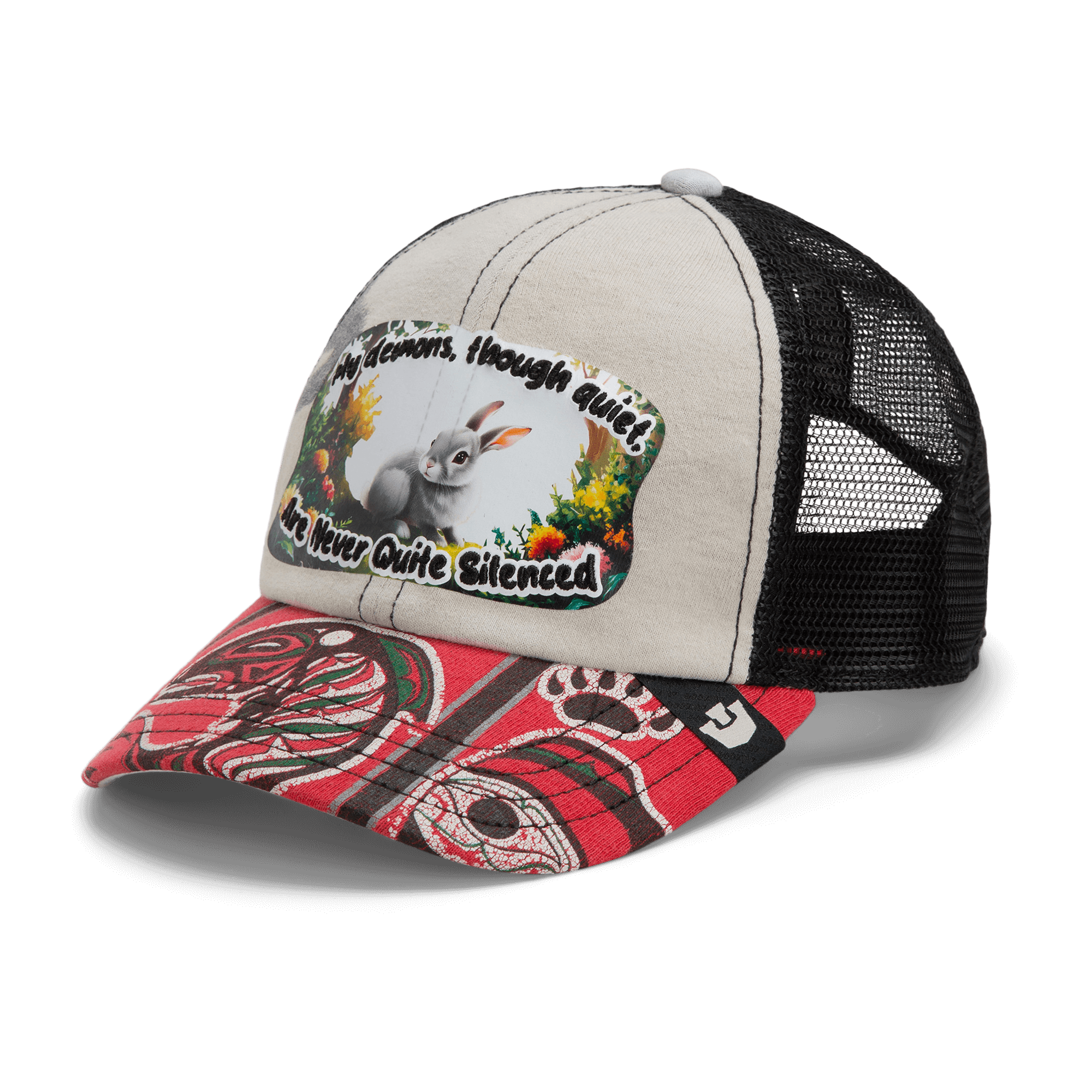 The Goorin Bros. Lil Ronin hat from our Storybook collection features a beige front, black mesh back, red patterned brim, and a rabbit patch that reads: “My demons, though quiet, are never quite silenced.”.
