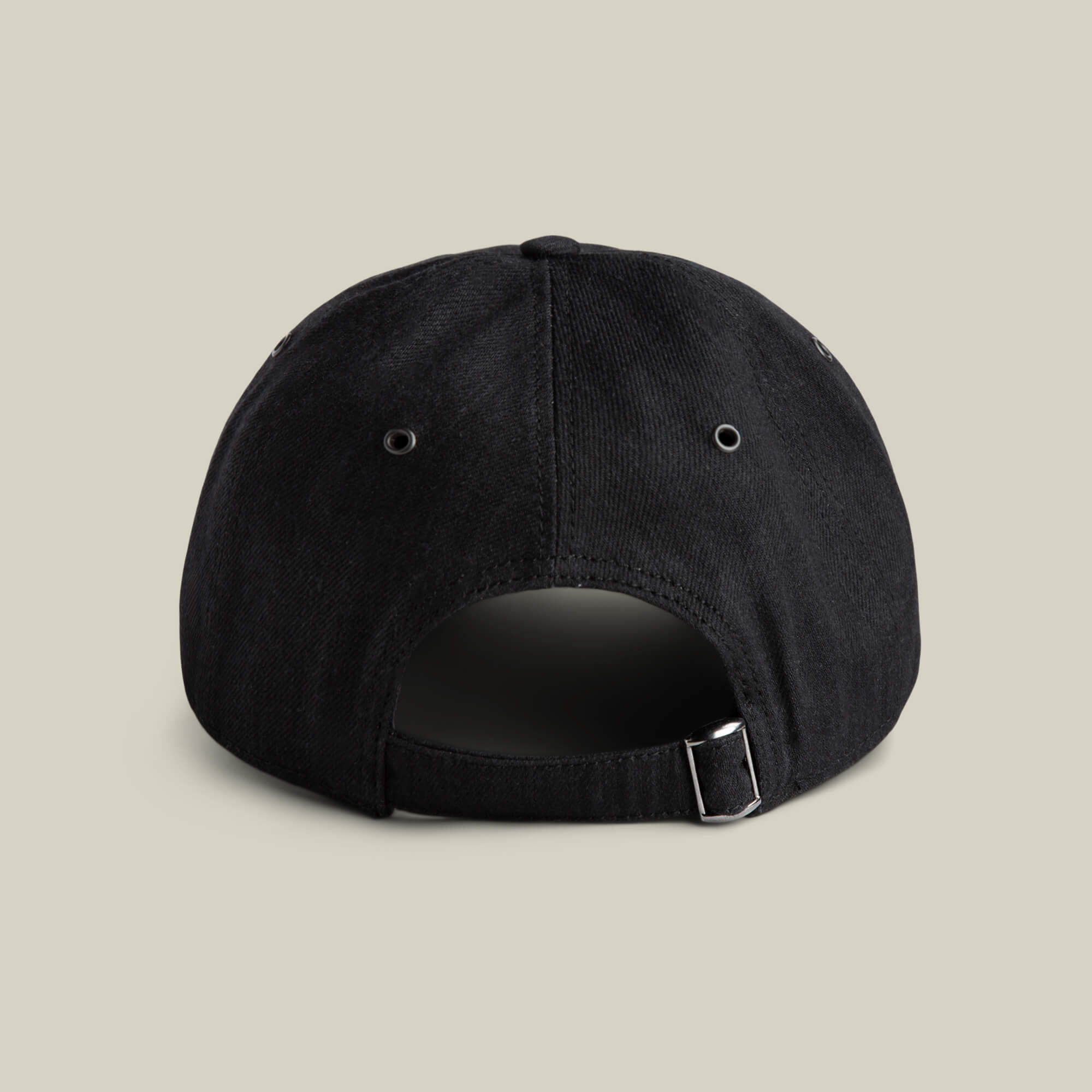 The Goorin Bros. Clean Denim Papa cap is shown from the back, highlighting its adjustable strap with a metal buckle and two ventilation eyelets.