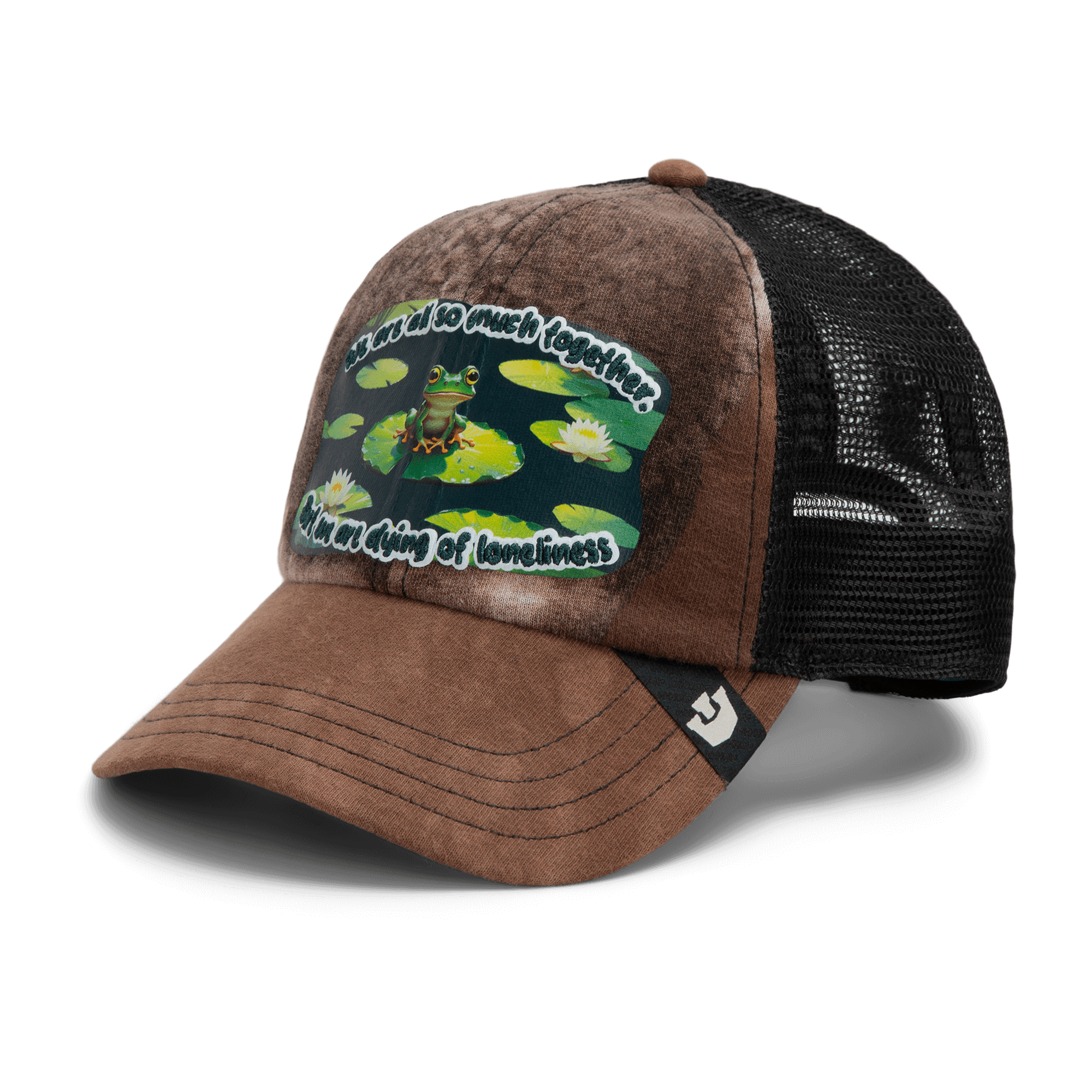 The Goorin Bros. Lil Sohei is a brown and black trucker hat from our Storybook collection, featuring a frog on lily pads and the phrase "It's a cold old swamp tonight, I'm the frog of loneliness.