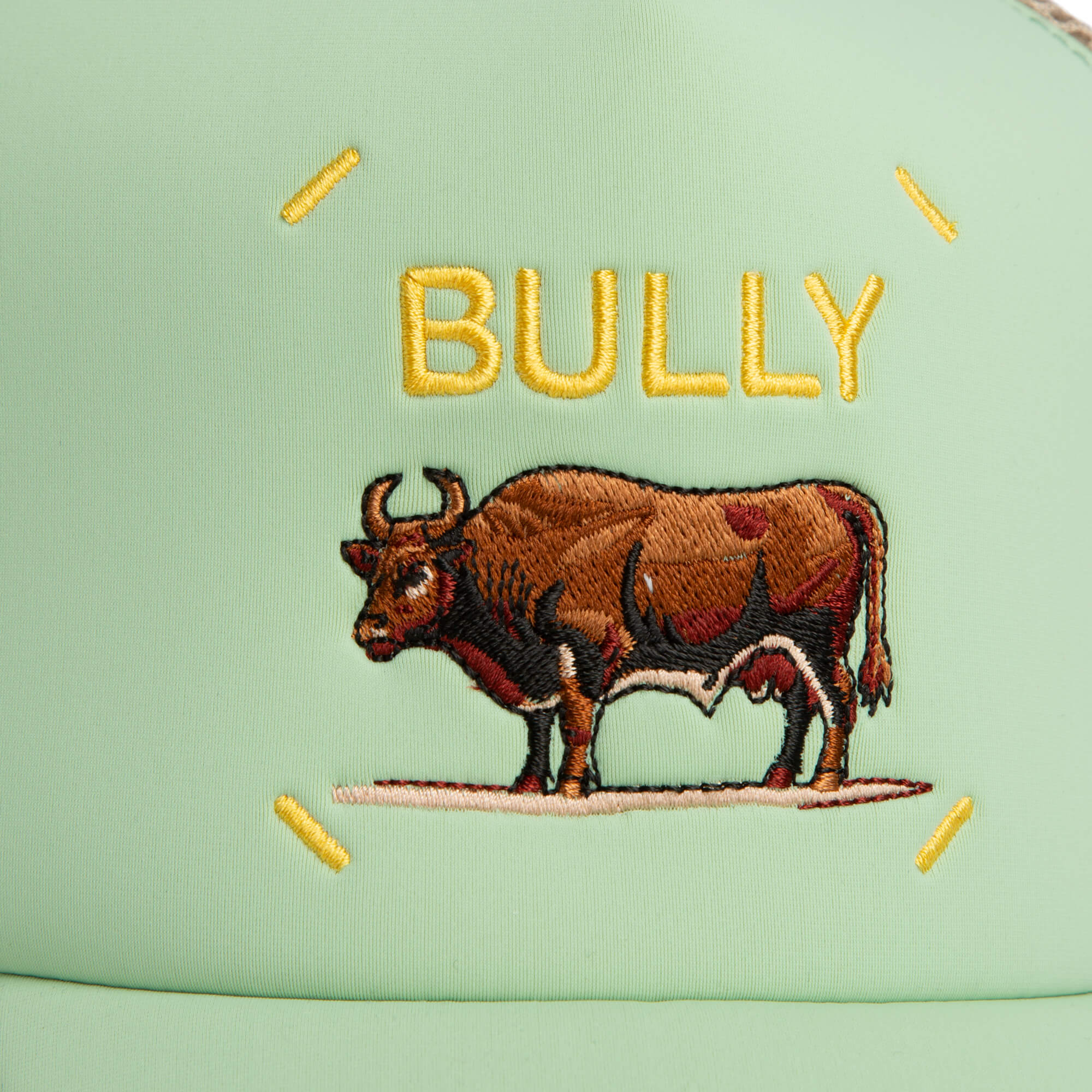 The Goorin Bros. Neo Farm - Bully Bull cap features a green color, an embroidered brown bull, and "BULLY" stitched in yellow—ideal for fans of grounded energy style.