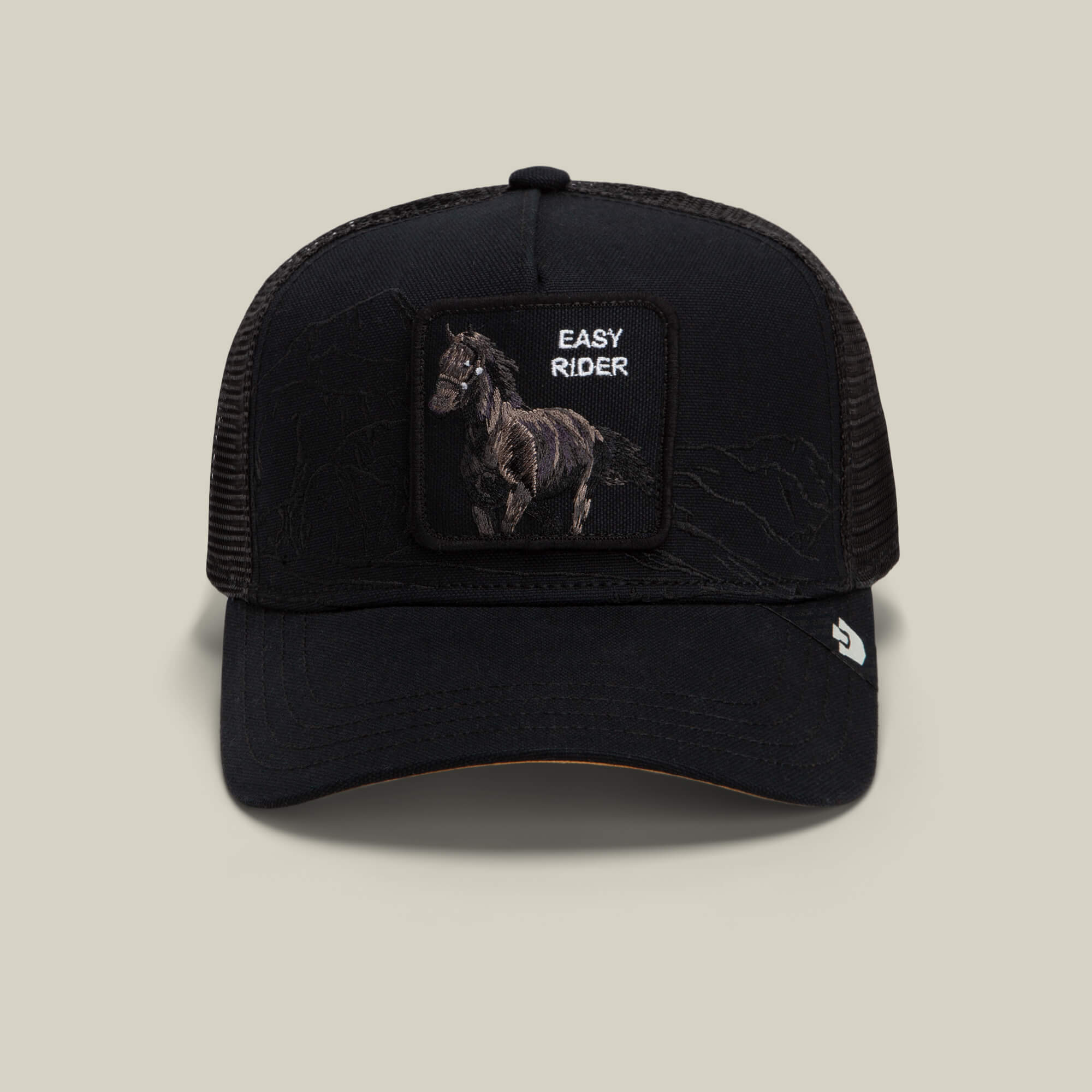 The Badlands Stallion by Goorin Bros. is a black mesh trucker hat featuring a front patch with an embroidered horse and the words EASY RIDER, a curved brim, and a small Goorin Bros. logo tag on the side.