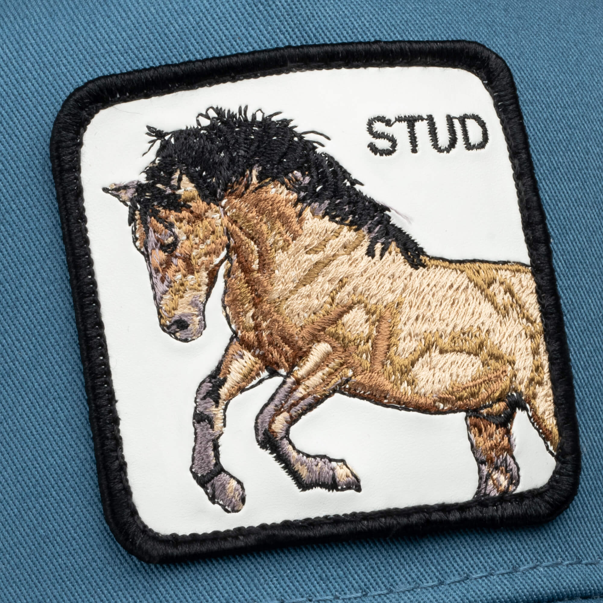 The Goorin Bros. "Dad and Pony Show" limited edition embroidered patch features a horse with "STUD" on blue fabric—ideal for customizing matching Father's Day hats or dad and kid caps.