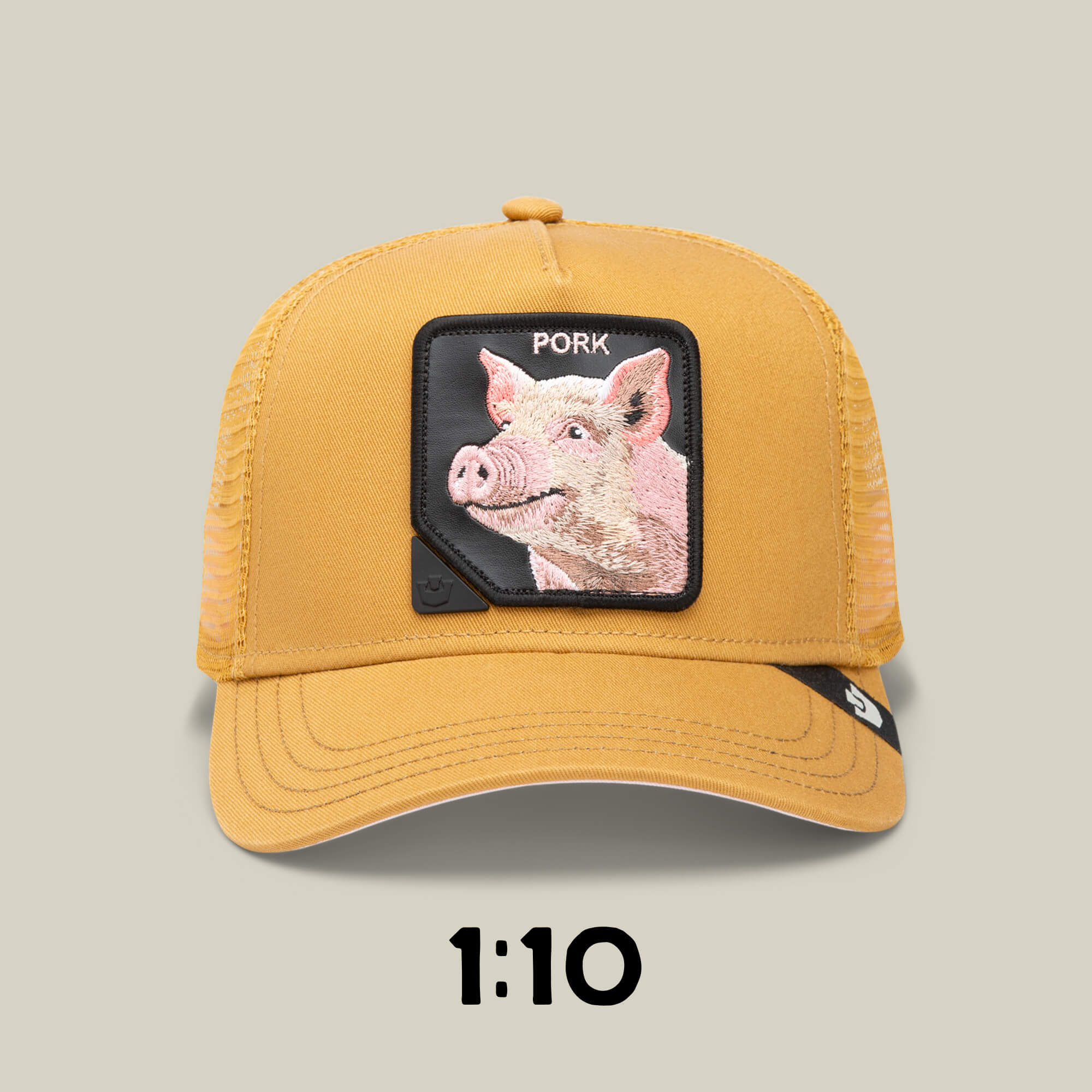 A yellow mesh Goorin Bros. trucker hat from the Blind Box 1: U R WUT U EET collection, featuring a pig patch with "PORK" embroidered above it, is displayed on a plain background with "1:10" written below.