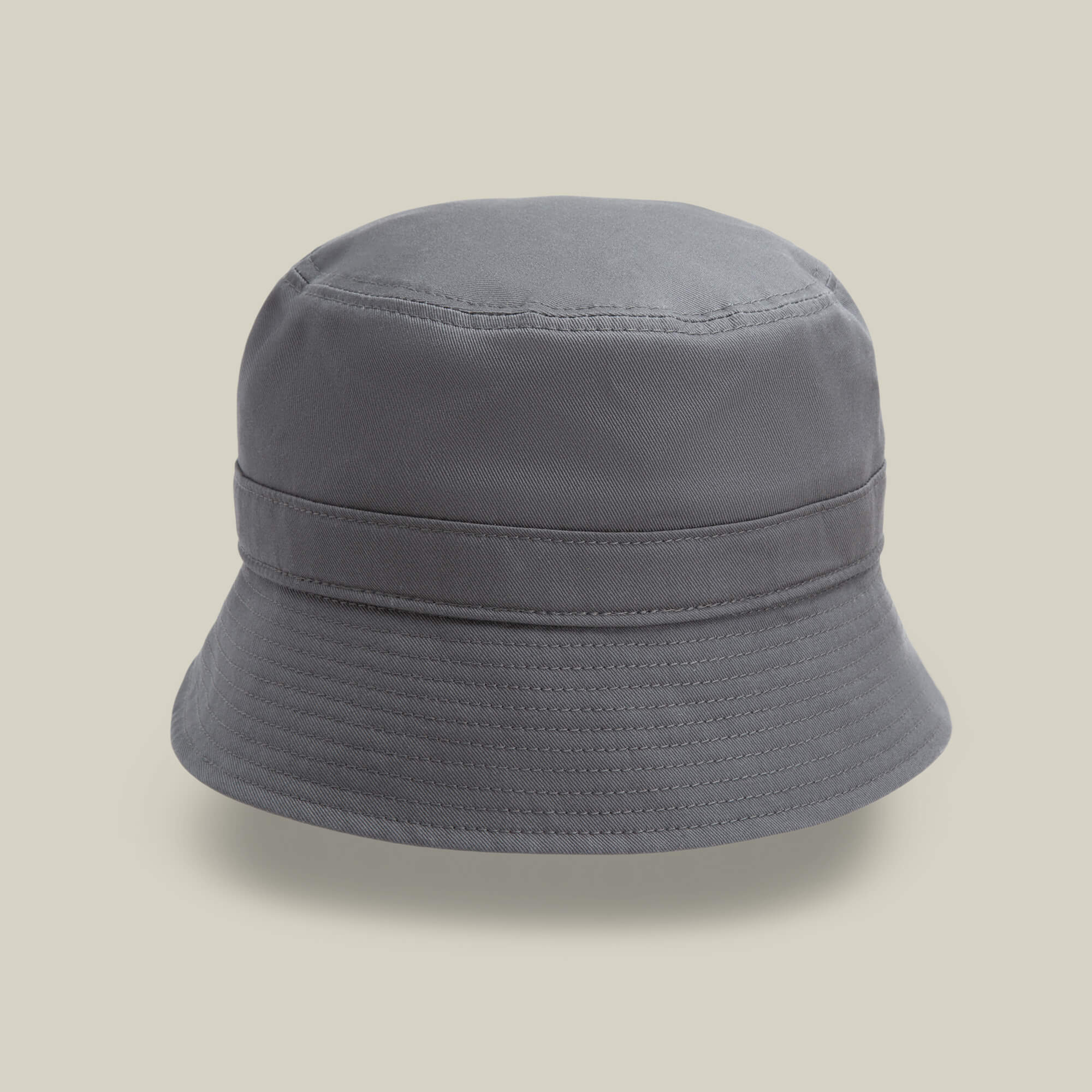 The Odyssey Bucket hat by Goorin Bros. in OIL color is shown against a light beige background.