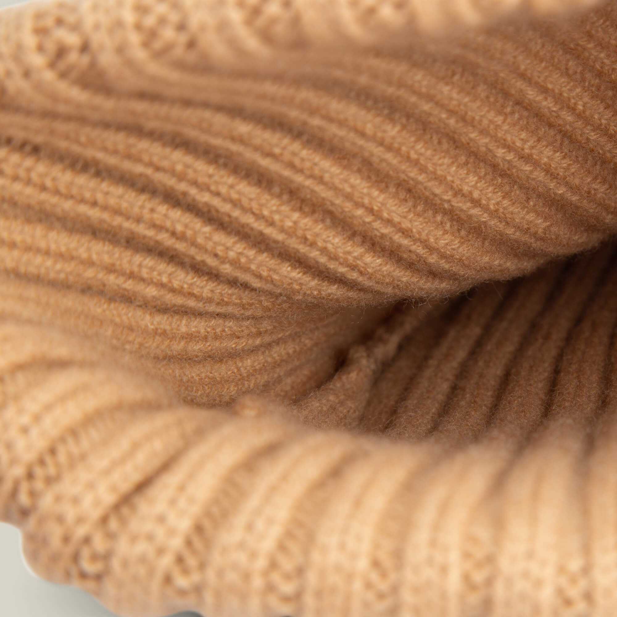 Close-up view of the tan ribbed knit fabric inside the Goorin Bros. Dream Cap, highlighting its texture and stitching details.