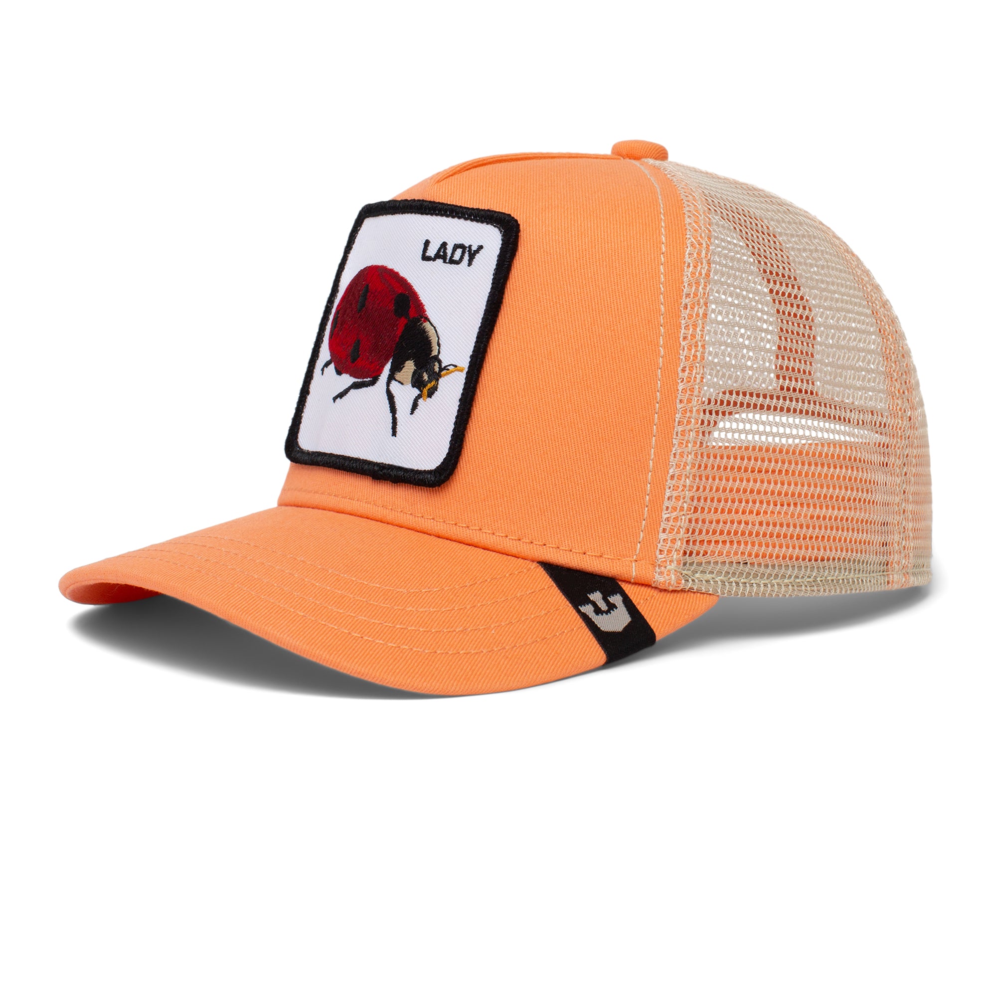 The Farm’s "Little Lady" is an orange and beige mesh trucker hat for kids (ages 4-10) with an adjustable fit. Features a front patch with a ladybug and the word LADY.