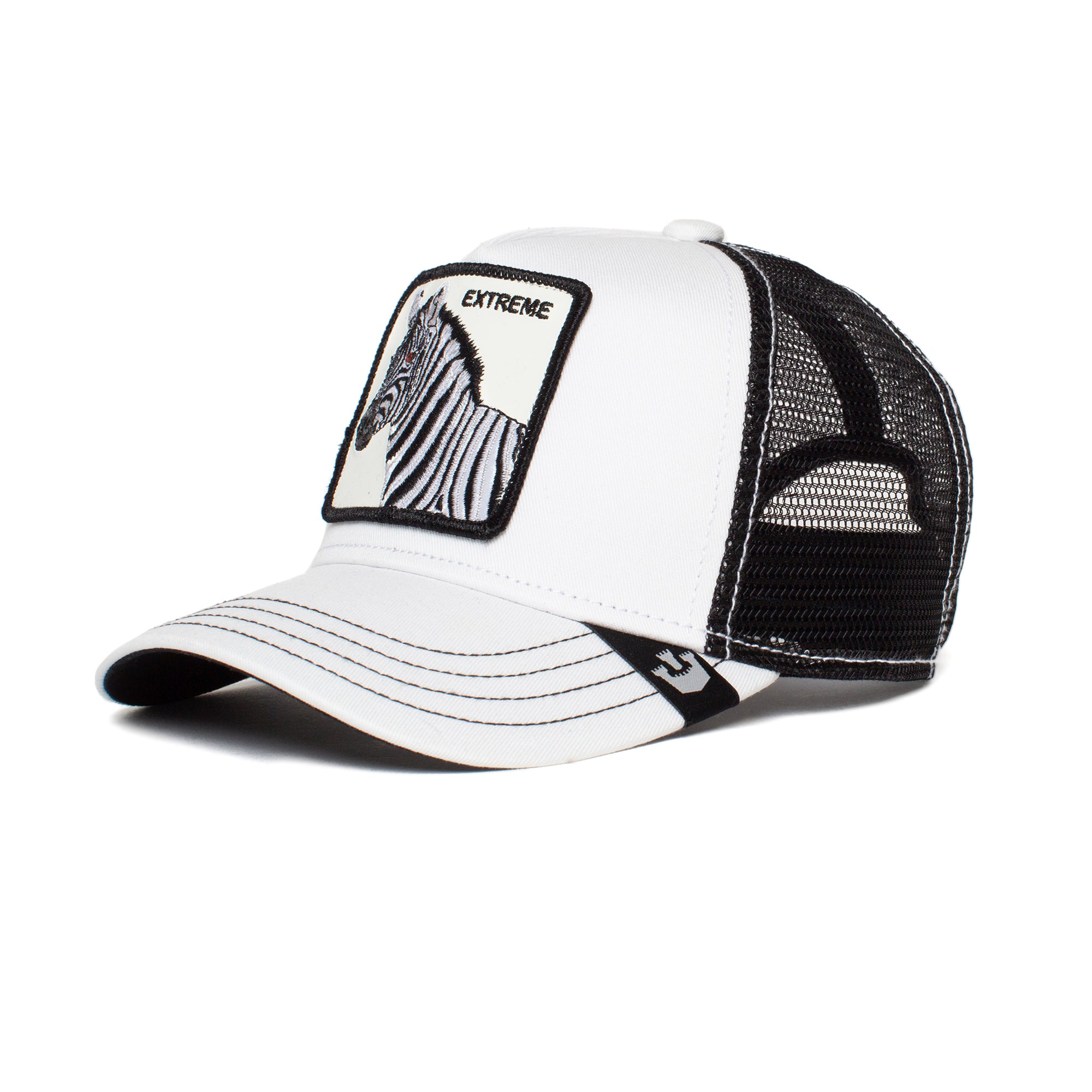 The "Little Stripe" by Goorin Bros. is a white and black mesh zebra hat with a bold animal patch labeled EXTREME on the front panel and black stitching details on the brim.