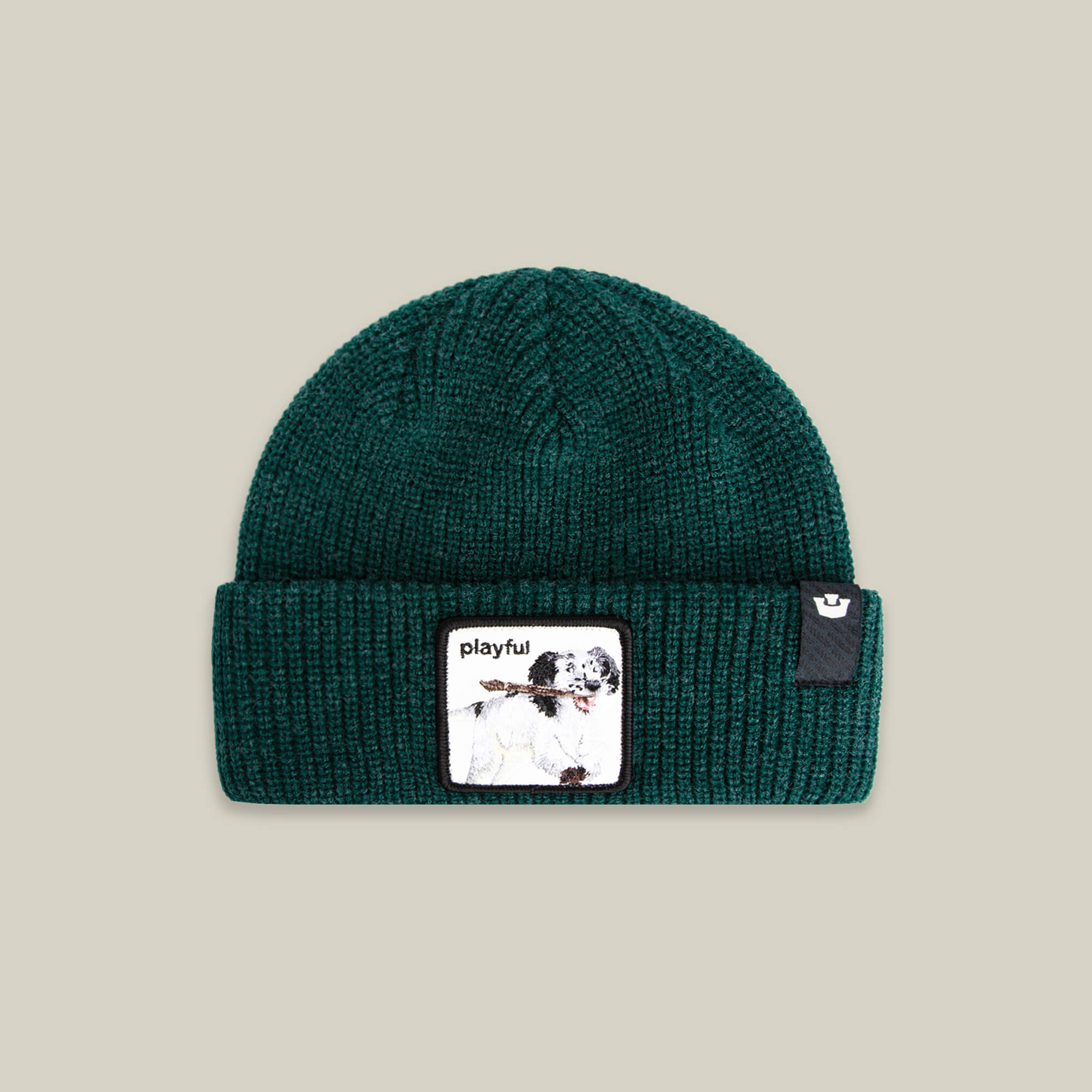 The Goorin Bros. Playful Beanie Mini is a cozy green knit kids hat with a folded brim, a dog illustration patch labeled "playful," and a small black side tag—perfect for keeping warm on chilly days.