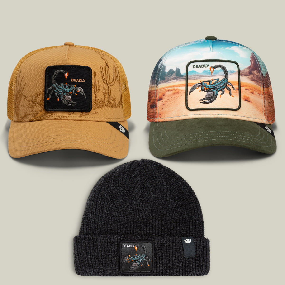 The *Get over Here Bundle* by Goorin Bros. showcases three hats: two trucker hats with scorpion patch accents and vibrant desert sunset designs, along with a black knit beanie featuring a bold scorpion patch.