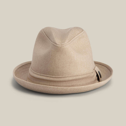 The Goorin Bros. Big Stepper is a beige fedora with a slightly creased crown and folded brim, showcased against a plain light background.