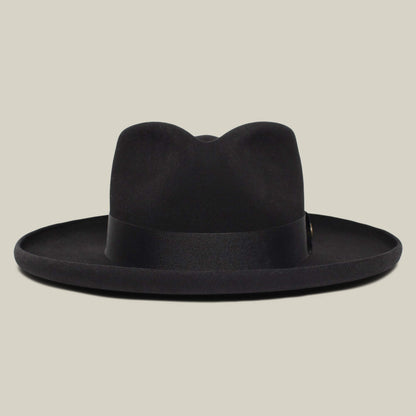 The Goorin Bros. Colonel Pierce is a black wide-brim fedora with a teardrop crown and black band, shown against a plain beige background.