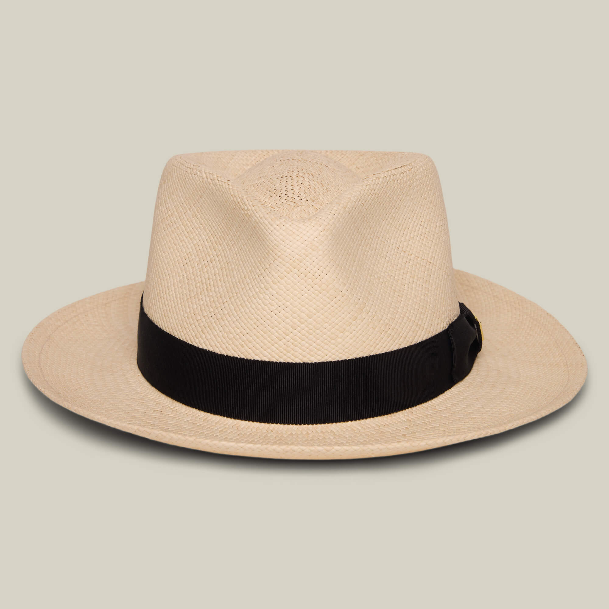The Goorin Bros. John Sr. fedora in Natural features a wide brim, black band, and 50 UPF sun protection, displayed against a light gray background.