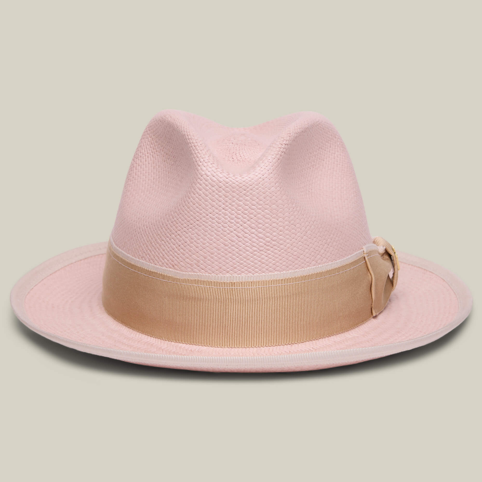 The Goorin Bros. Hartman fedora in WHISPER features a wide beige grosgrain hat band and bow, shown against a plain light background.