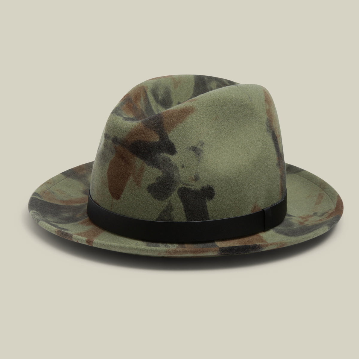 Dean the Butcher by Goorin Bros. is a CAMOUFLAGE fedora featuring a sleek black band, crafted in the USA and displayed on a plain beige background.