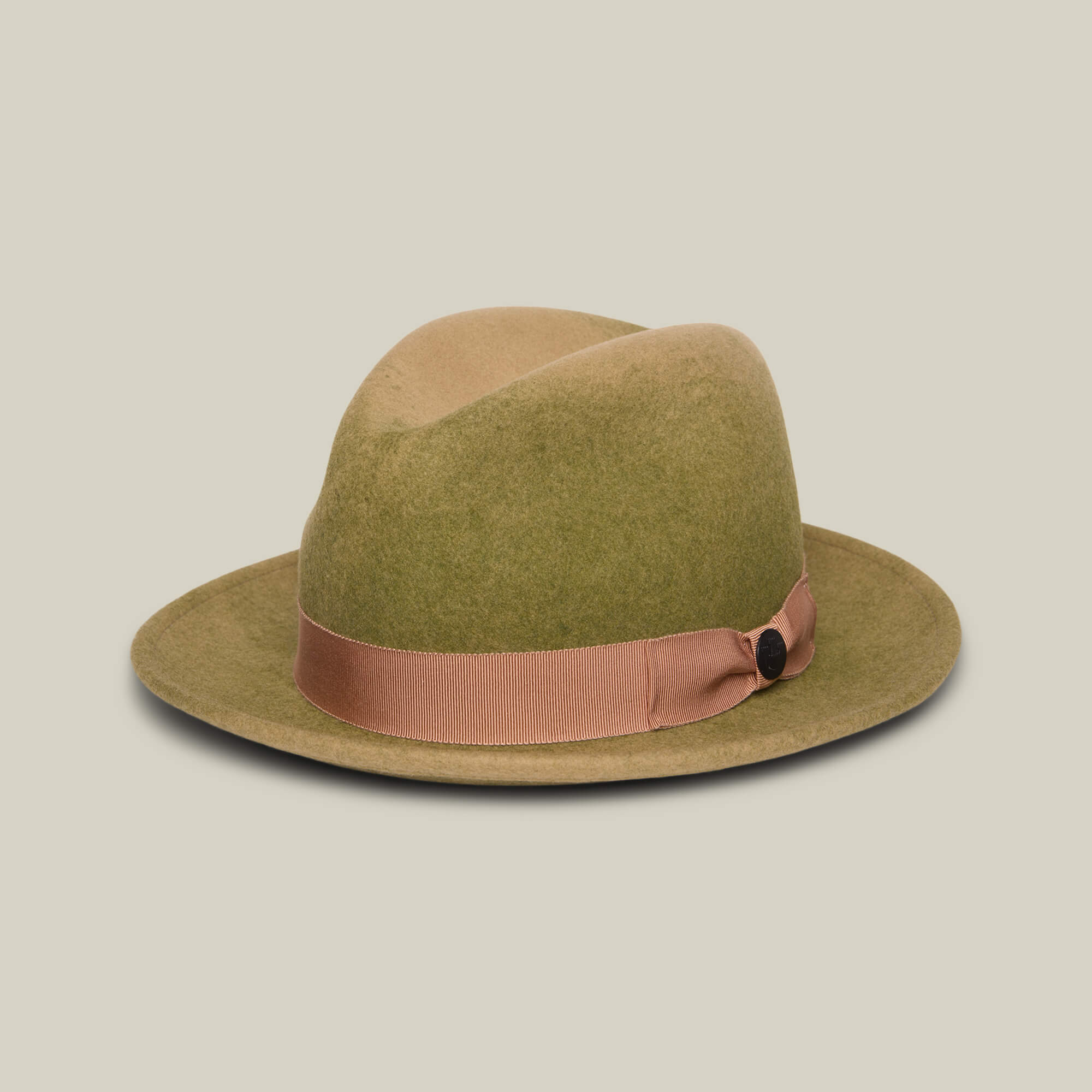 Dean the Butcher by Goorin Bros. is a greenish-brown felt fedora with a wide brim and light brown ribbon band, American-made for all seasons and shown on a plain light background.