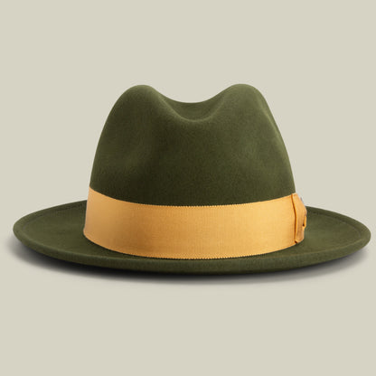 Dean the Butcher by Goorin Bros. is a green felt fedora with a wide gold grosgrain hatband, made in America and displayed on a plain light background.