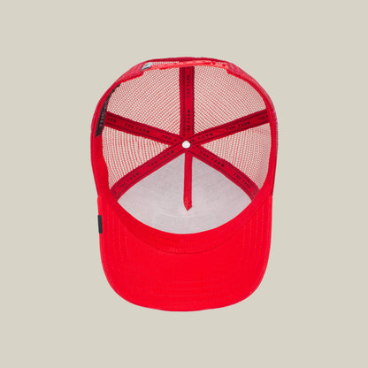 The Cock by The Farm is a red mesh trucker hat seen from above, revealing the inner mesh lining and bands. Its bold design draws inspiration from the rooster, a timeless emblem of resurrection and vitality.
