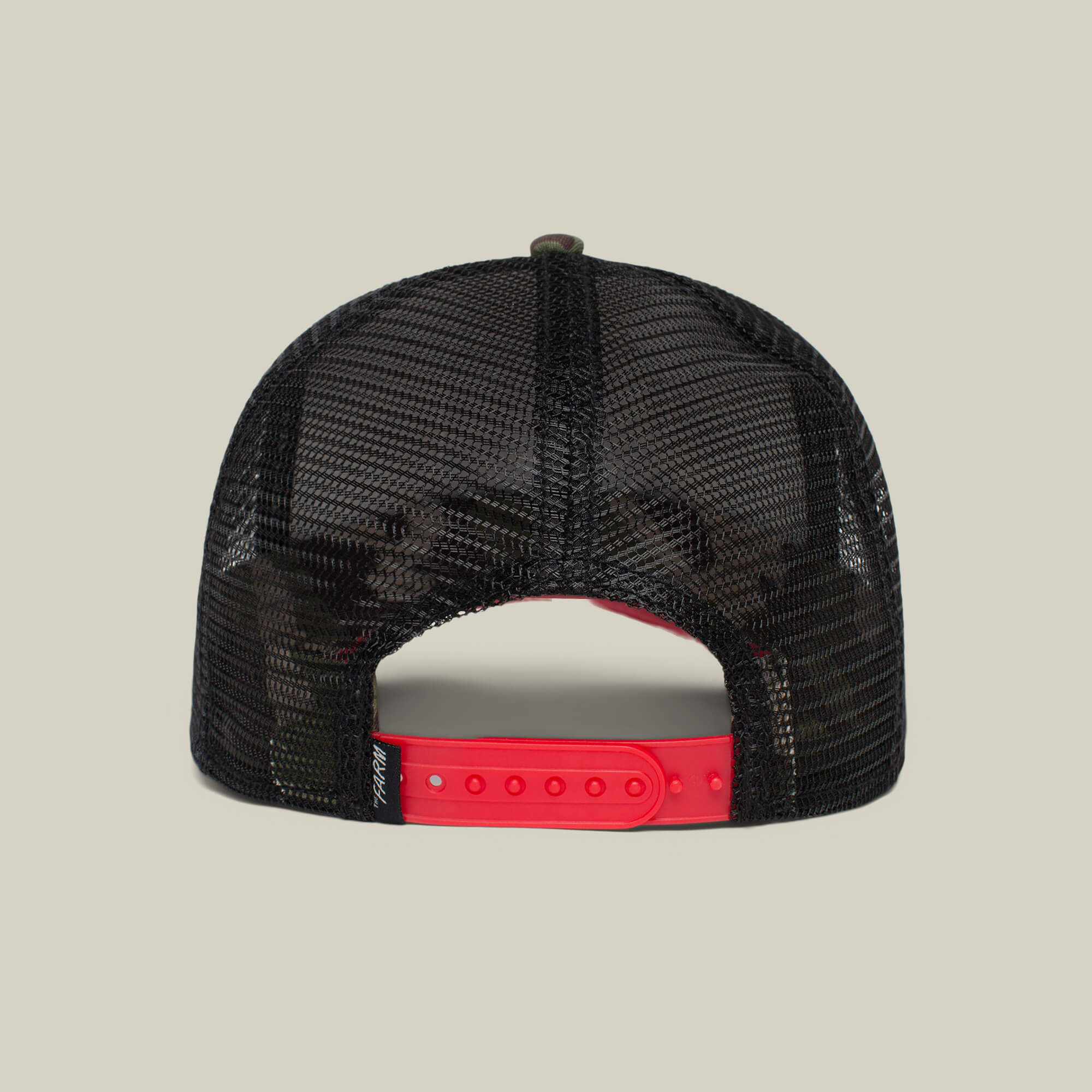 The Panther by Goorin Bros. is a black mesh trucker baseball hat, shown from the back with a red adjustable snap closure and a small black tag on the left side—perfect for fans of classic style.