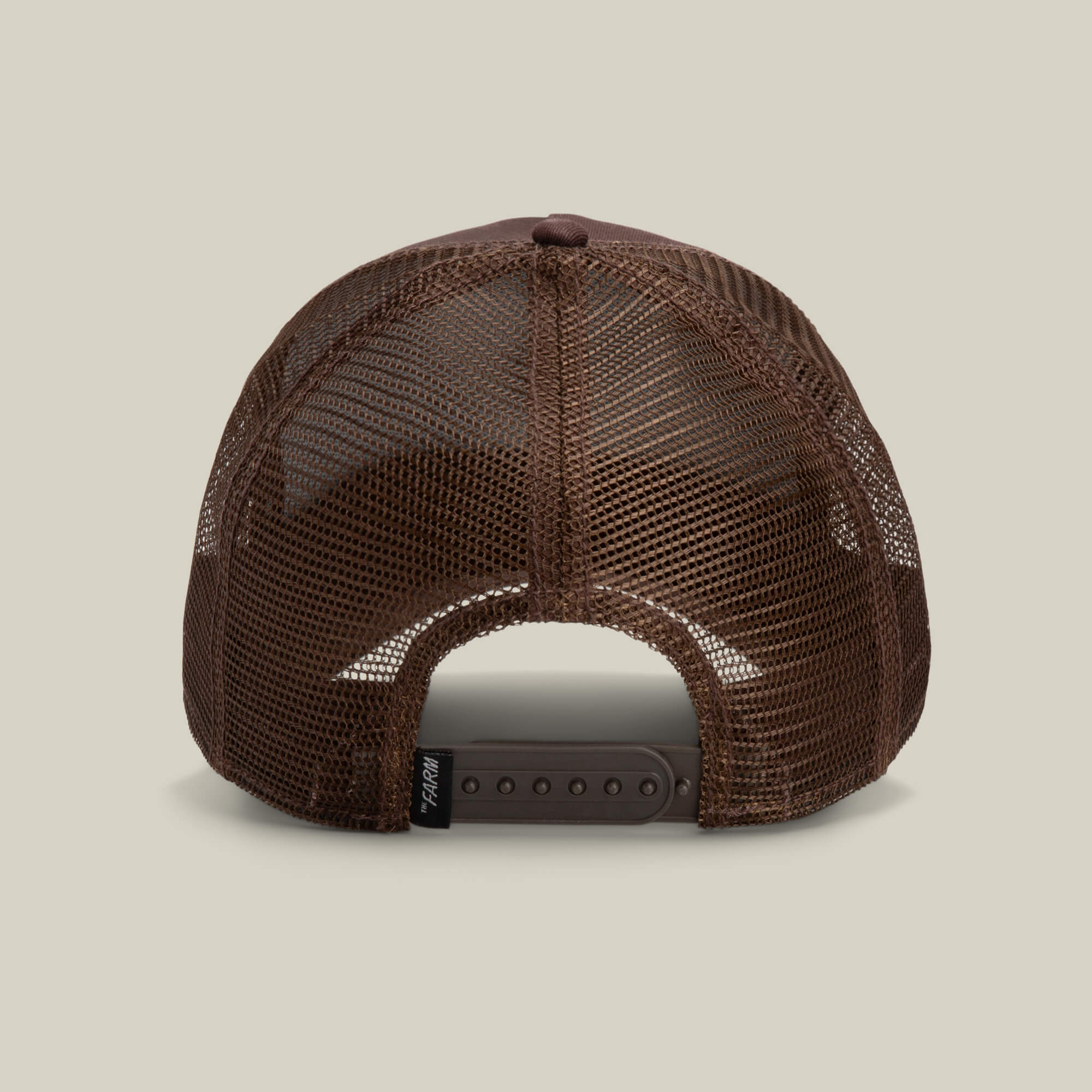 Back view of The Panther trucker baseball hat by Goorin Bros. in brown mesh with an adjustable snapback closure, set against a plain background.