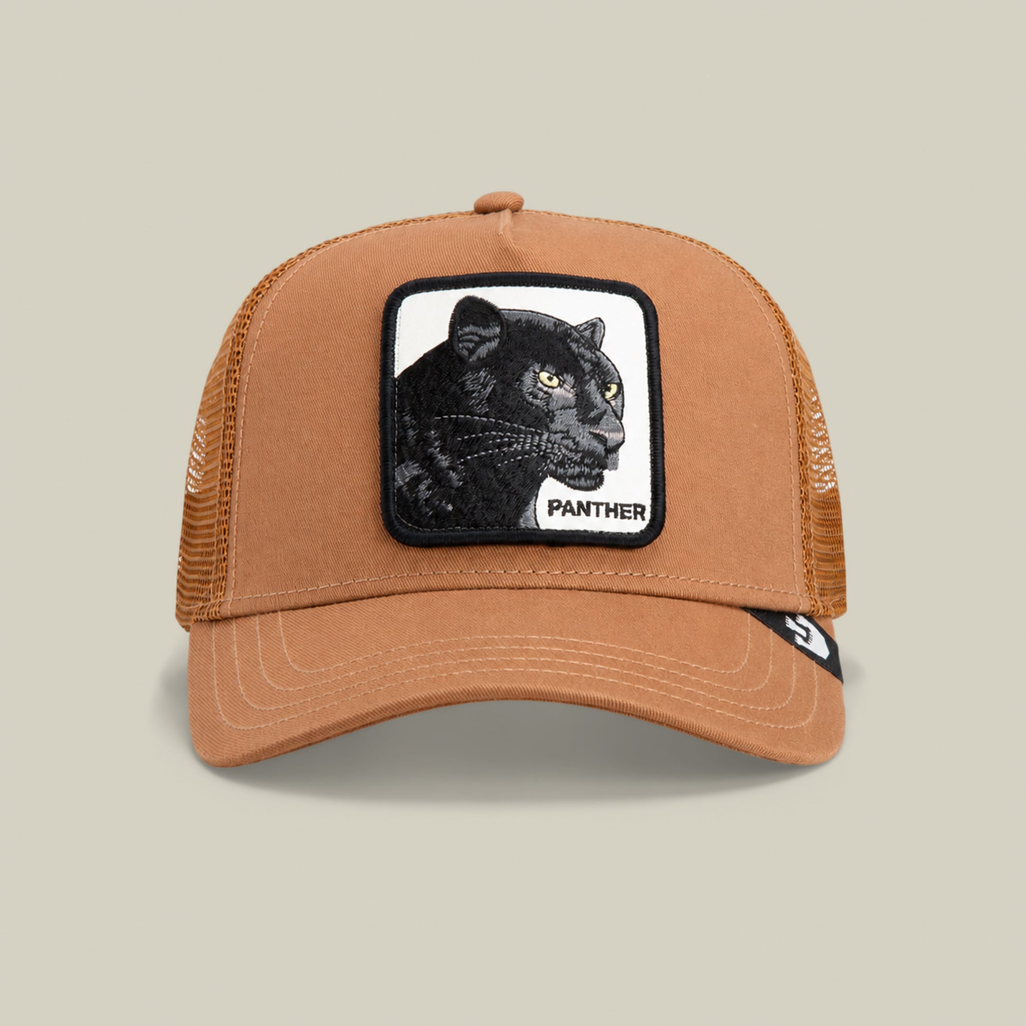 Chocolate mesh trucker hat from Goorin Bros.’ The Farm line, called “The Panther,” featuring a front patch with an embroidered black panther and the word PANTHER below the image—perfect for fans of the classic panther trucker hat style.