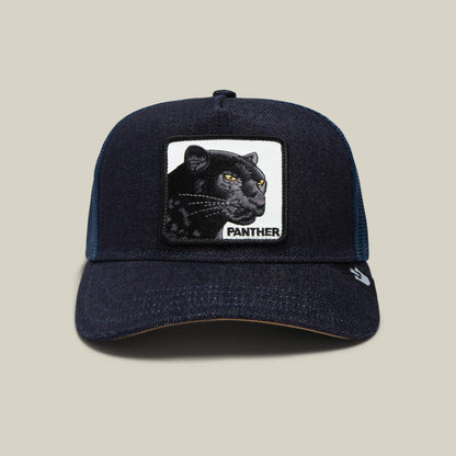 The Panther by Goorin Bros. is a dark blue trucker hat with a mesh back and a front patch displaying an embroidered black panther head and the word "PANTHER.
