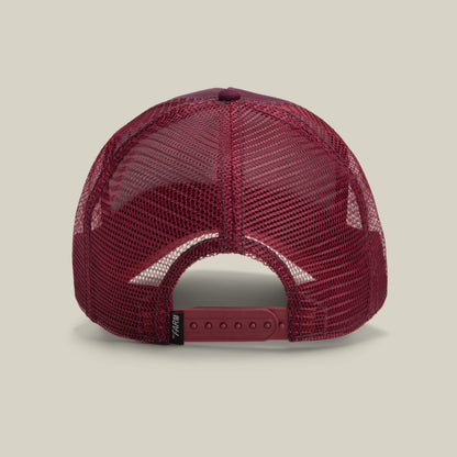 The Panther by Goorin Bros. is a maroon mesh trucker baseball hat, shown from the back, featuring an adjustable snap closure and a small black Ninja Kitten tag.