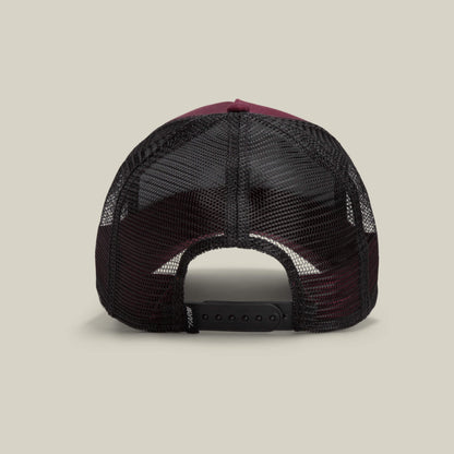 The Panther by Goorin Bros. is a maroon and black mesh-back trucker hat from The Farm collection, shown from the rear with an adjustable snapback closure, blending classic style and modern comfort.