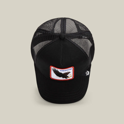 The Farm's The Freedom Eagle is a black mesh trucker cap with a front patch showing an eagle and the word FREEDOM in red—a bold way to express your style and keep your distance.
