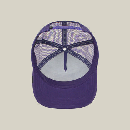 The Lone Wolf by The Farm is a purple mesh trucker hat with an adjustable strap and interior branded taping reading THE FARM, shown from above—ideal for the independent spirit.