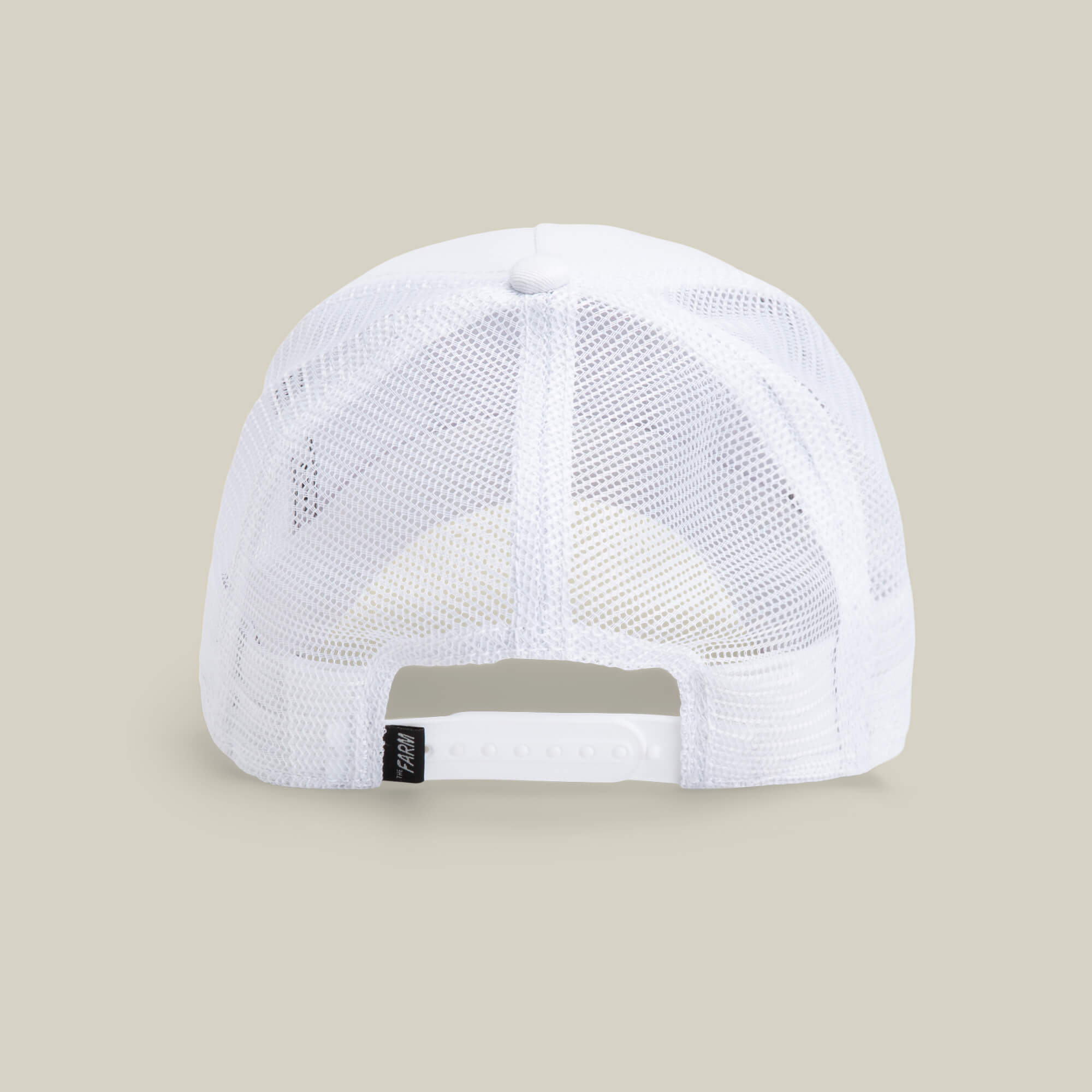 The Farm’s The Queen Bee cap features a white mesh back, adjustable snap closure, and a small black tag on the left side—wear it to crown your look with effortless style.