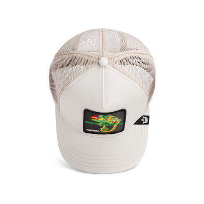 The Karma Chameleon by The Farm is a beige mesh baseball cap, shown from the back, featuring a vibrant colorful patch and a side tag with a white arrow—ideal for spreading good karma wherever you go.